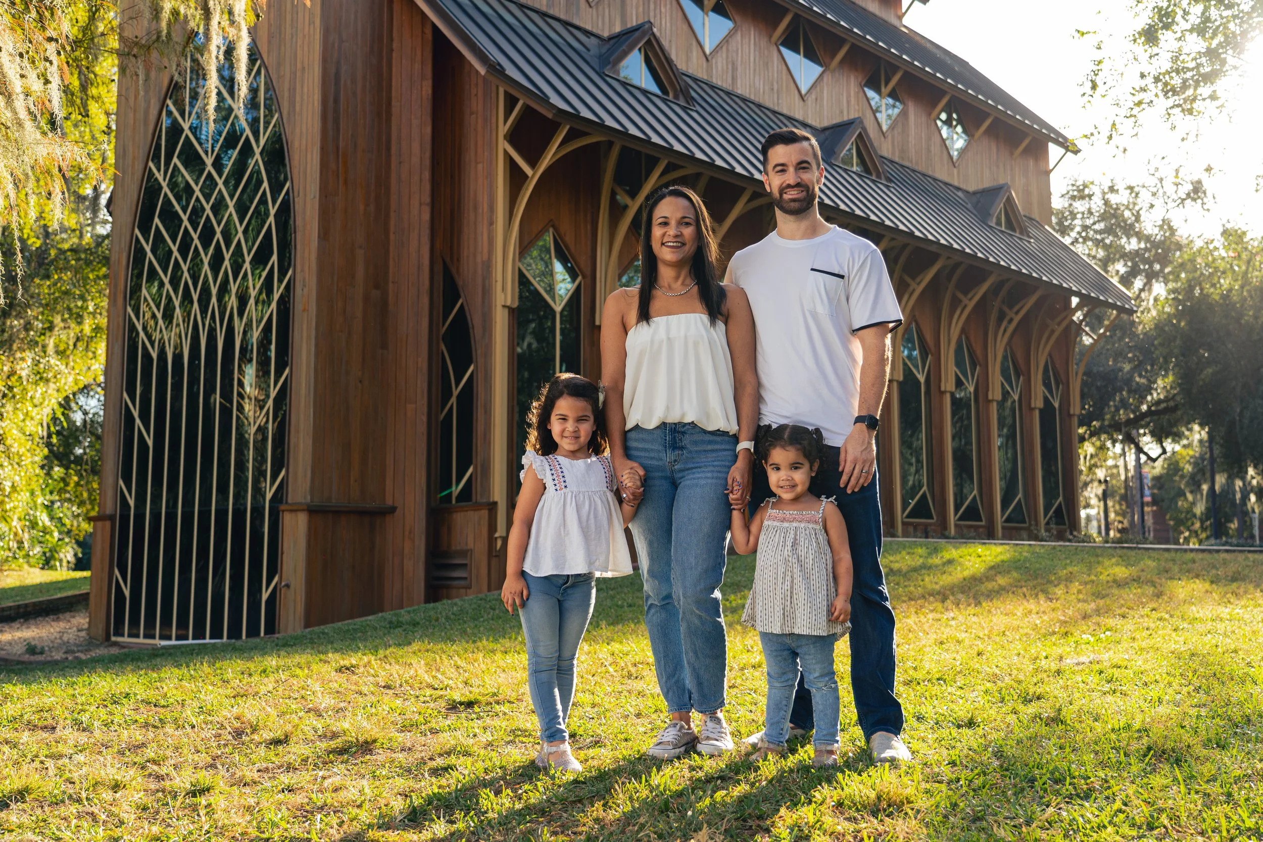 family of four poses