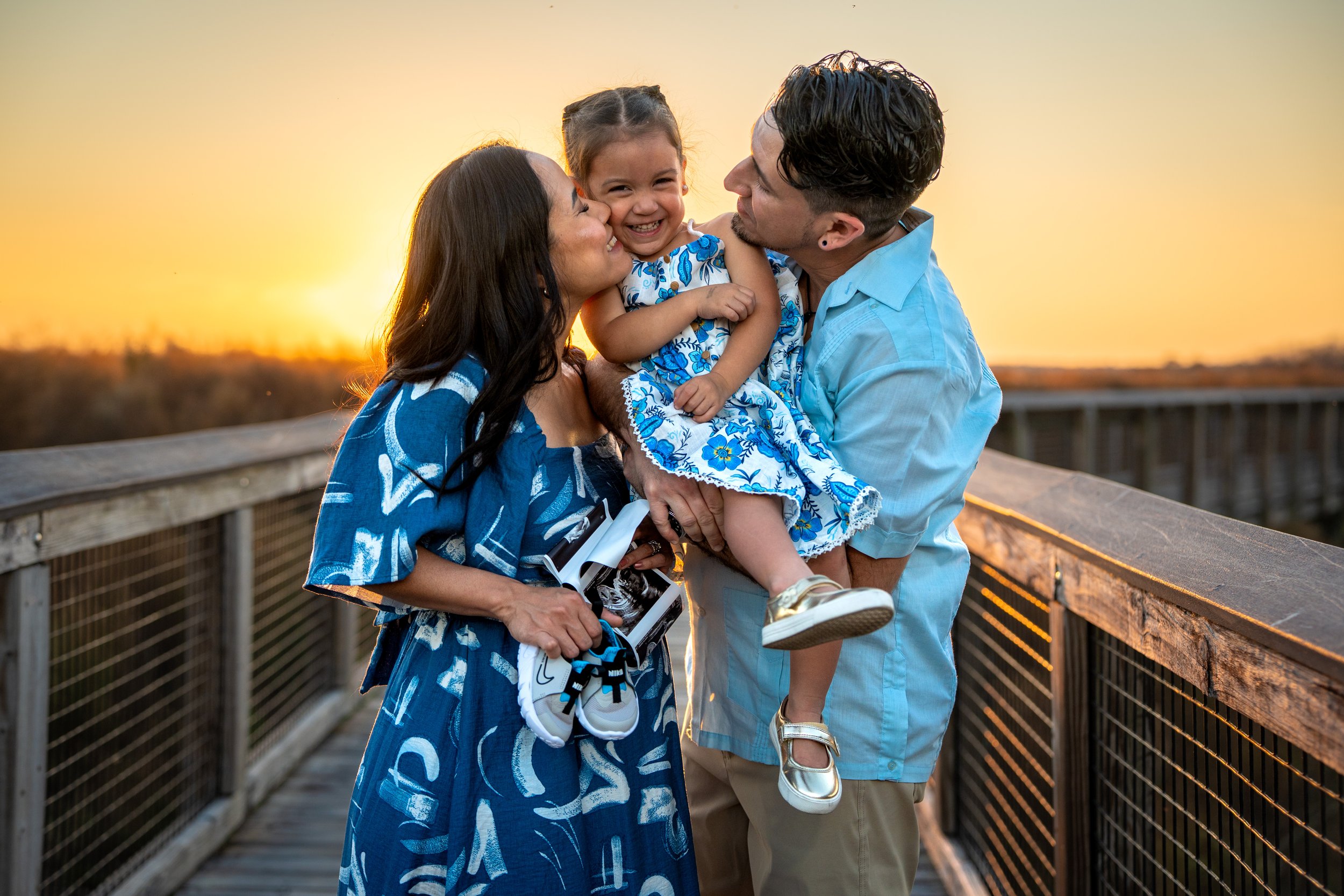 family of three with young daughter