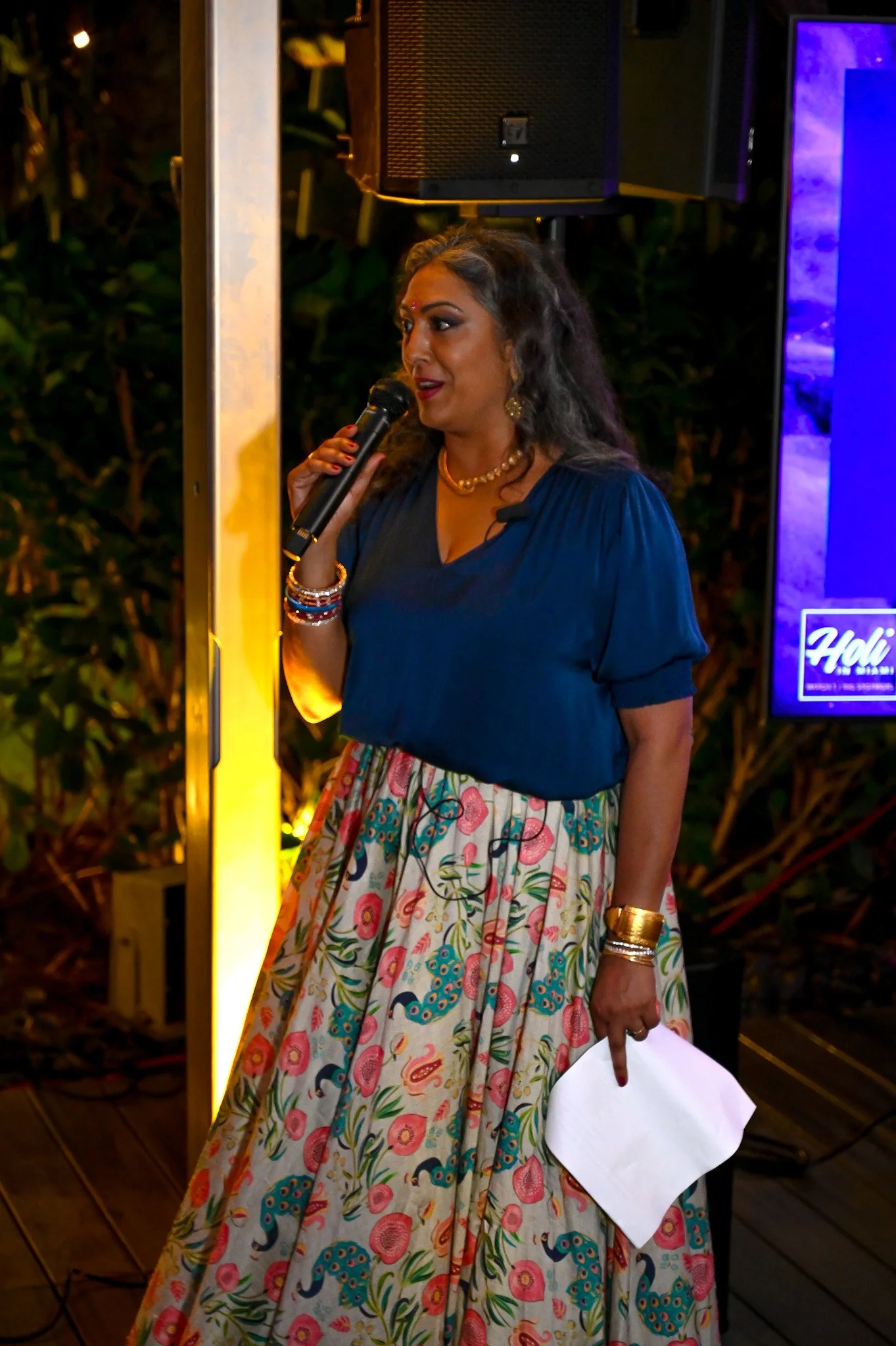 President of Desai Foundation Megha Desai giving a speech.JPG