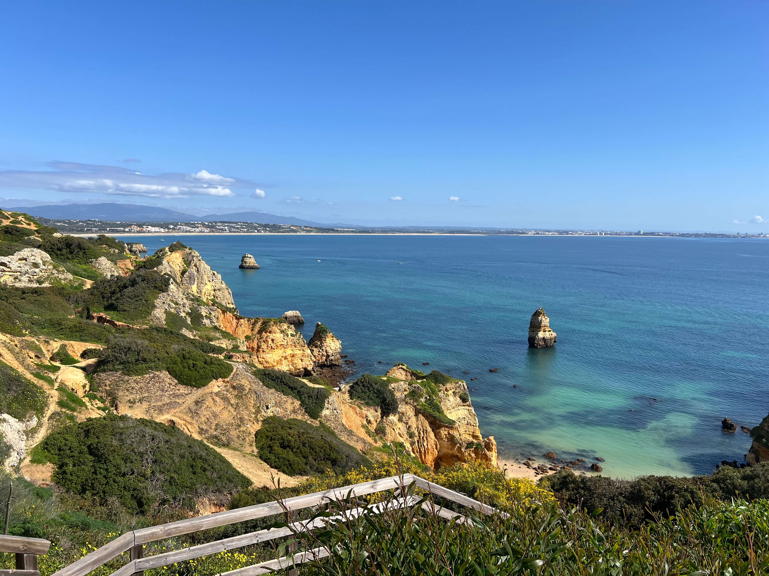Panoramic view of the coastline and turquoise sea from Ponta da Piedade cliffs Lagos