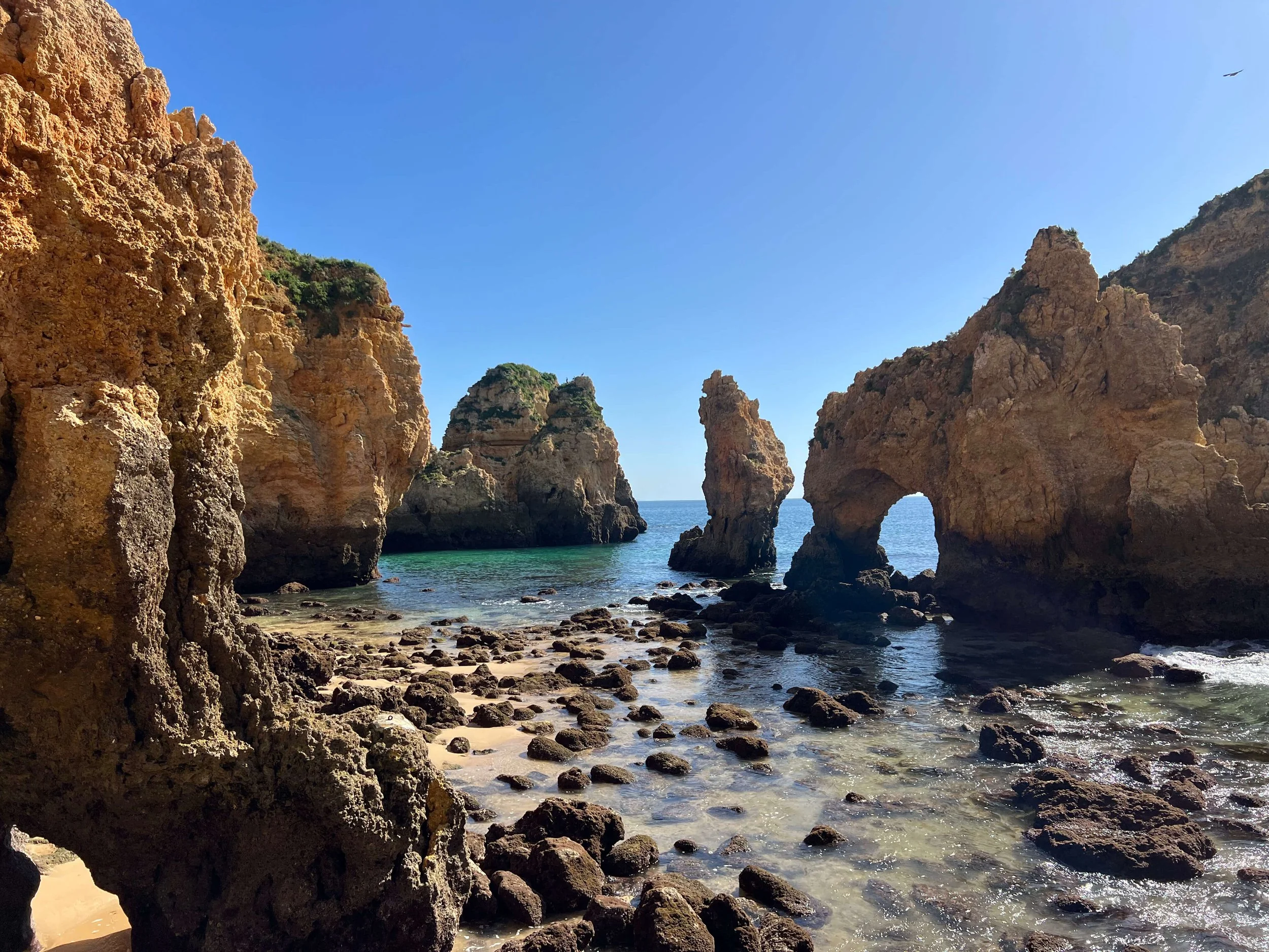 Rock formations and sea arch seen from the staircase at Ponta da Piedade Lagos