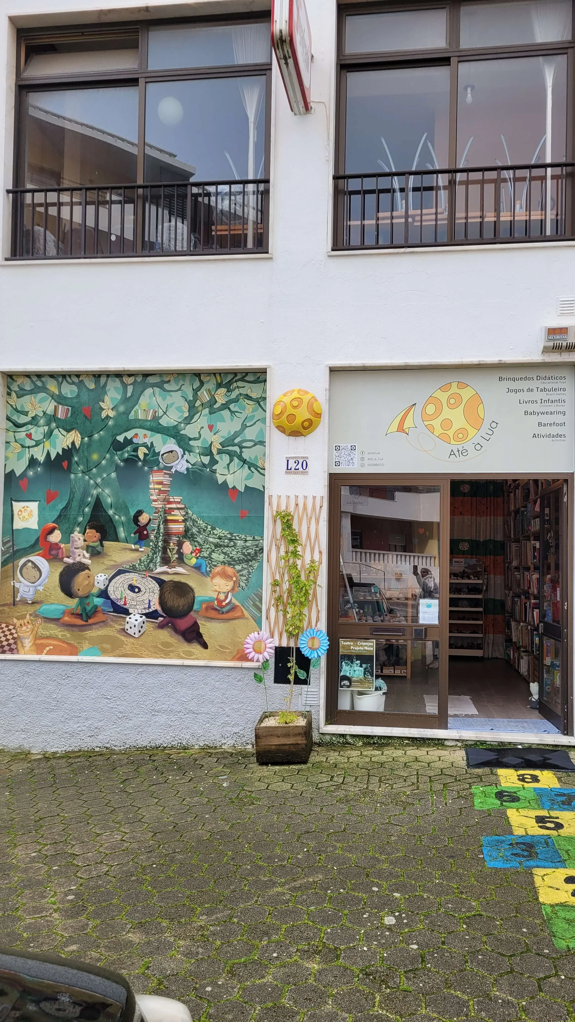 Ate a Lua children's bookshop entrance in Lagos with colourful mural and hopscotch on the pavement