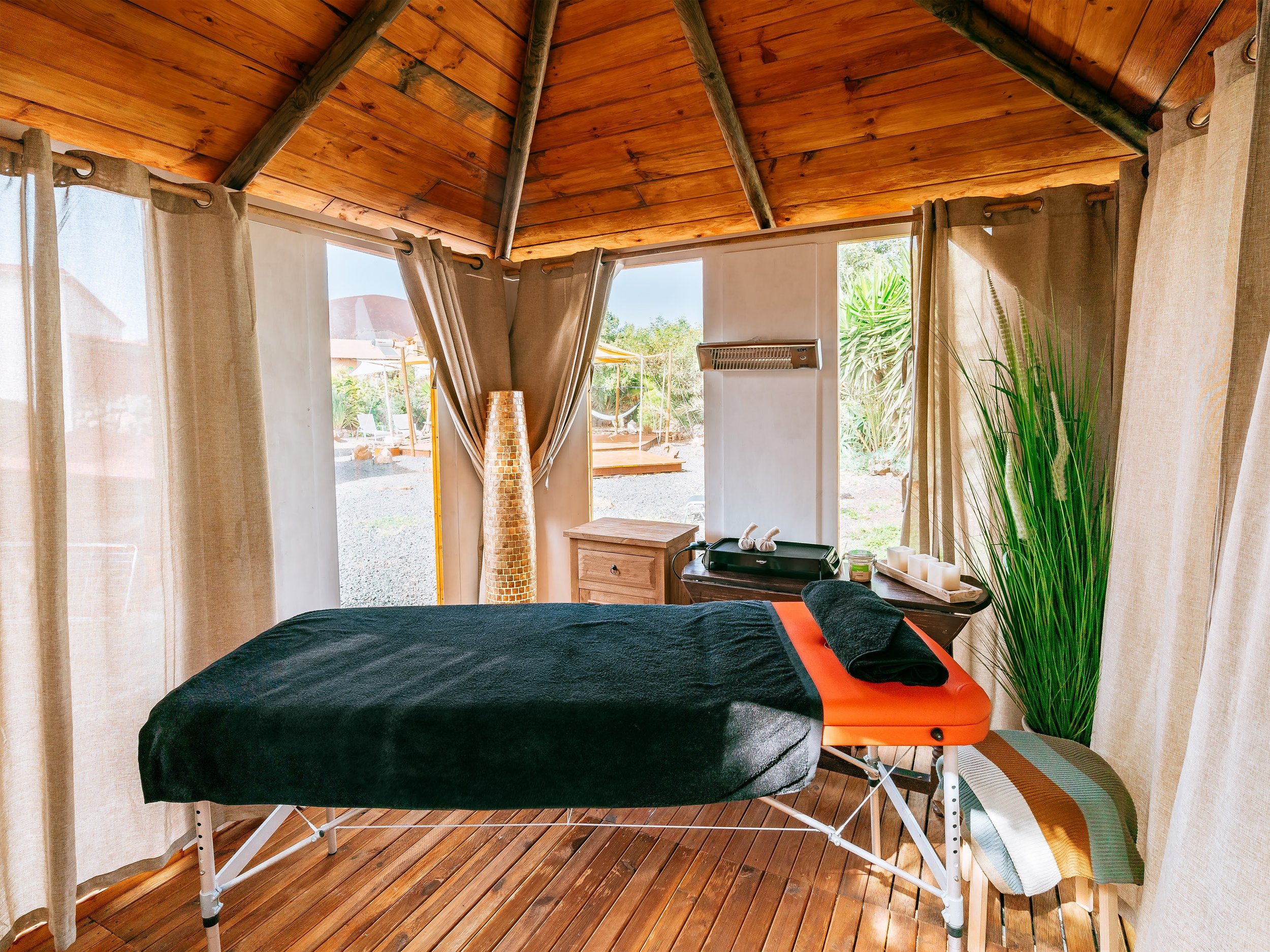 massage-bed-in-garden-beside-pool
