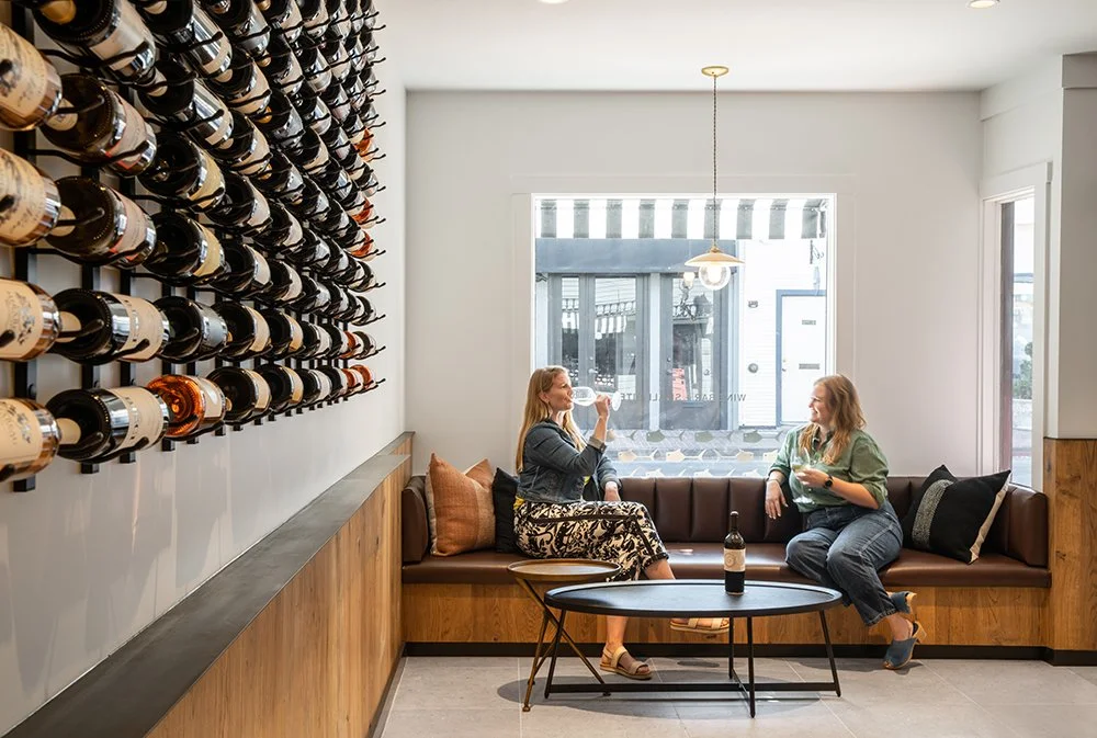 Custom wine bottle display wall at Squalo Vino, a space-saving design feature in this 600-square-foot Tiburon wine bar"
