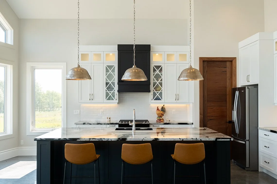 Modern kitchen with sink in island
