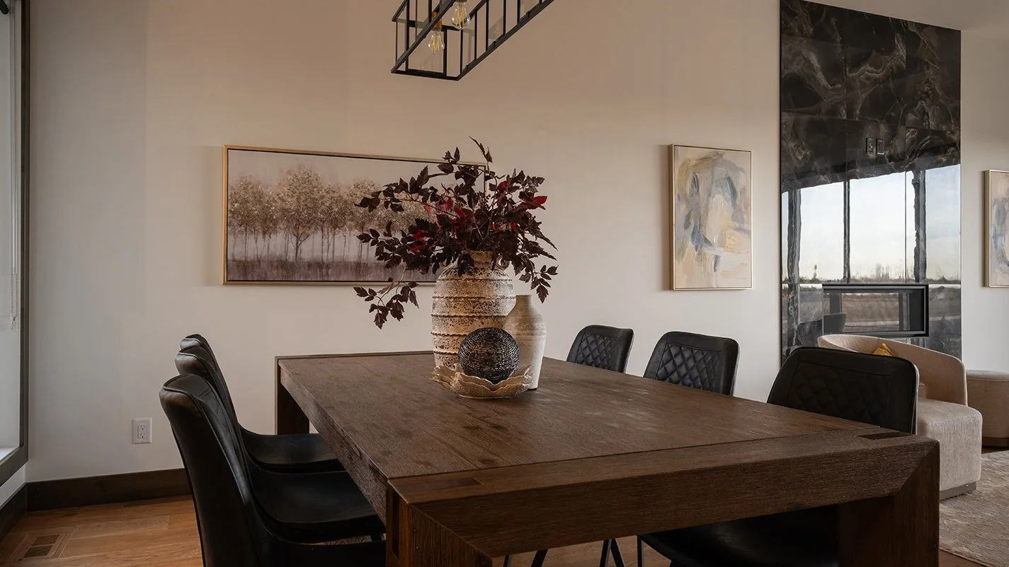 Image of dinning space with dark wood table
