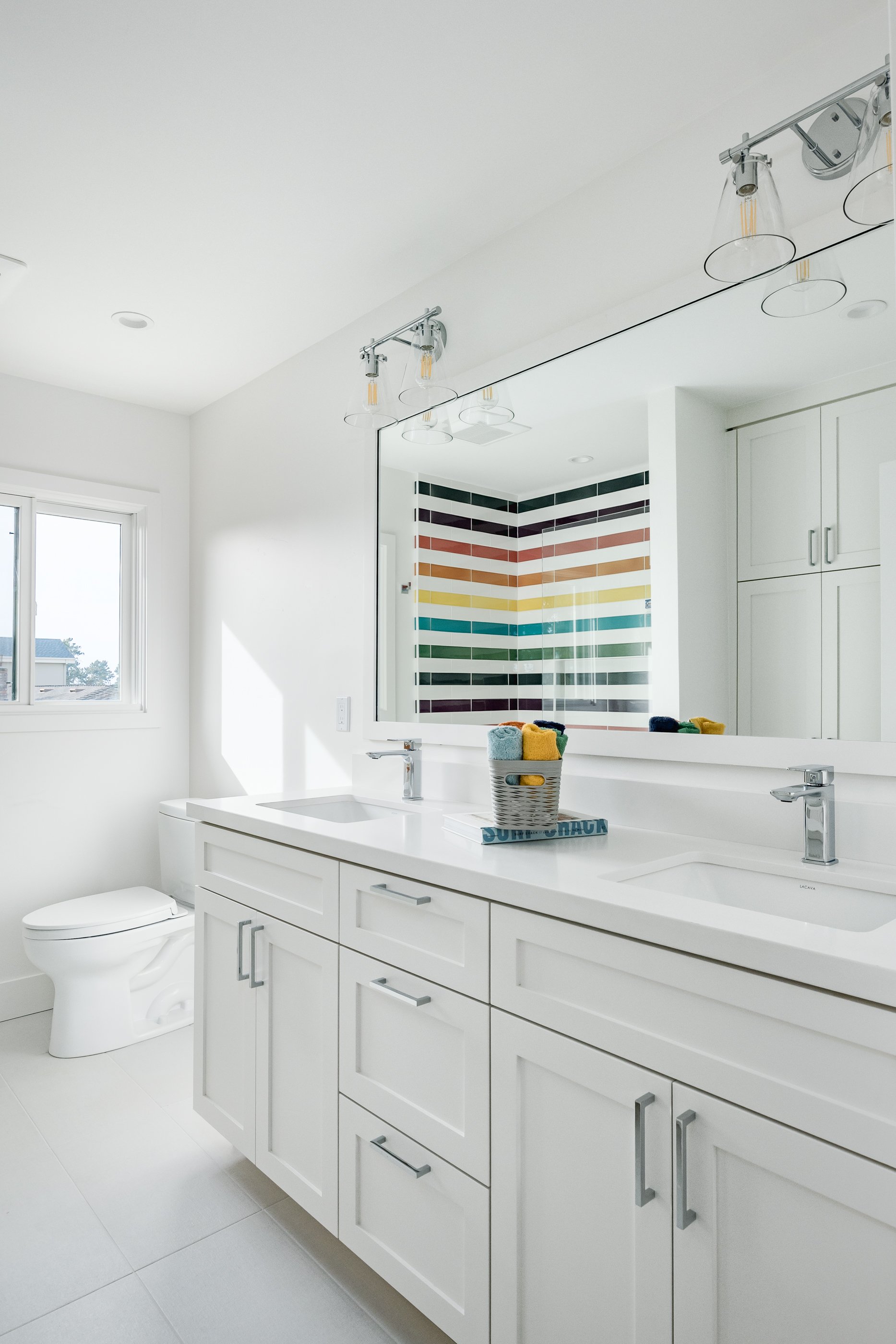 Natural light and color theory make this bathroom pop!