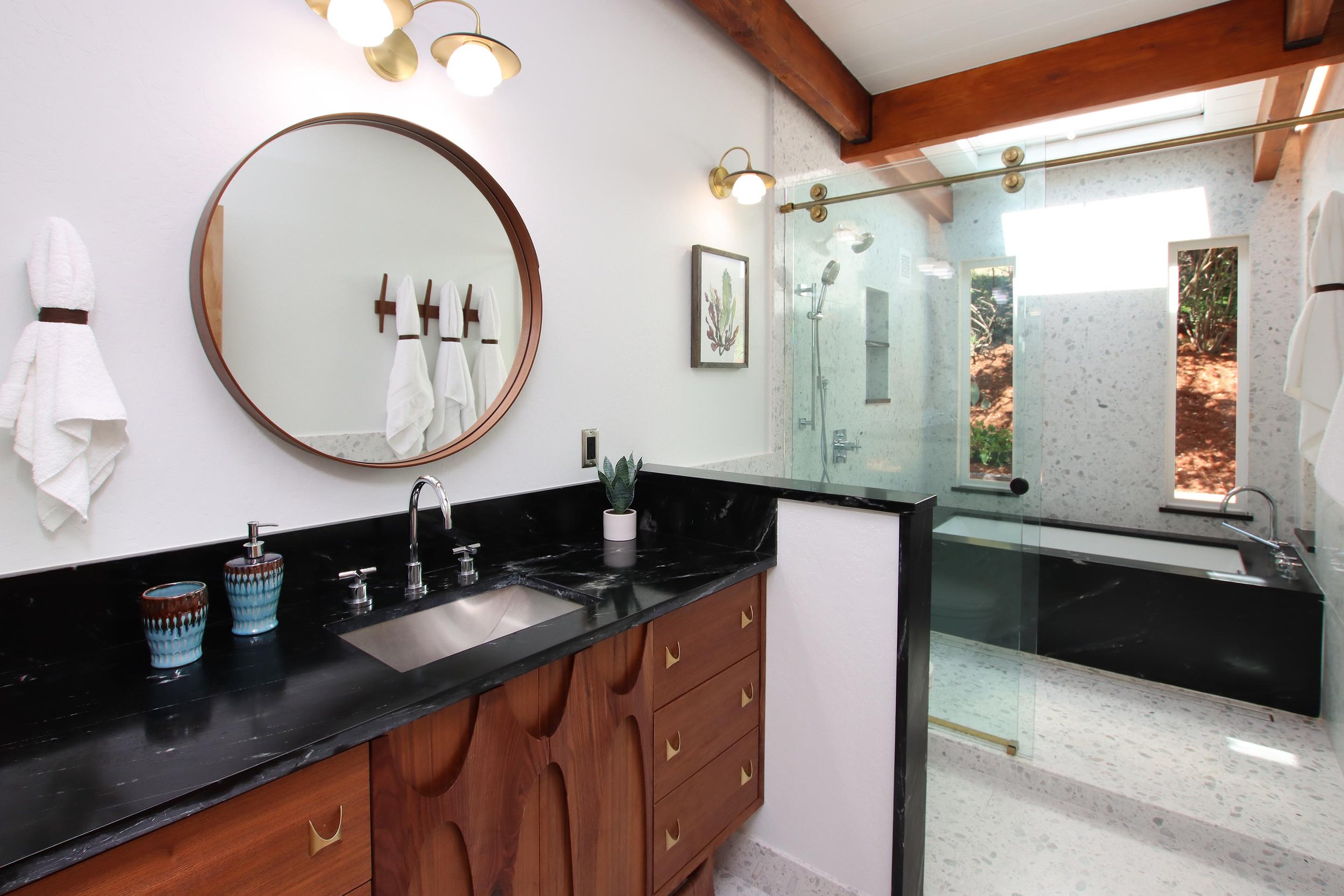 Vintage vanity with beautiful design work picked by the homeowner.