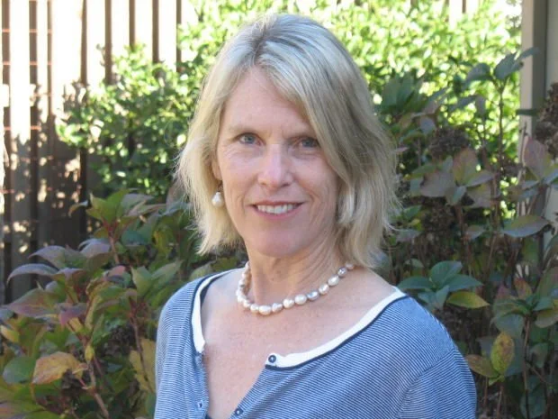 Happy client sharing her success story after wellness coaching.