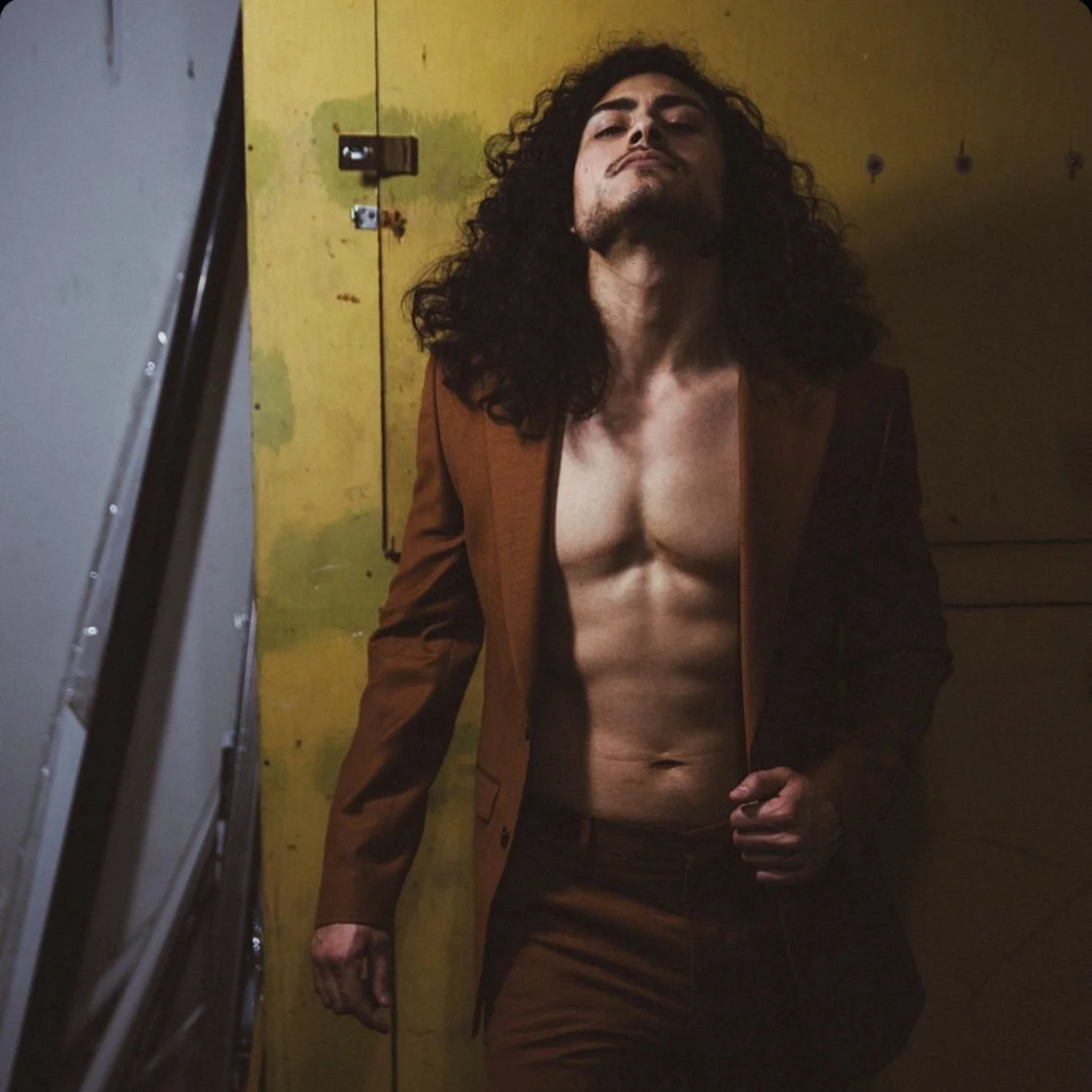Emmett Preciado - orange suit 1.jpg