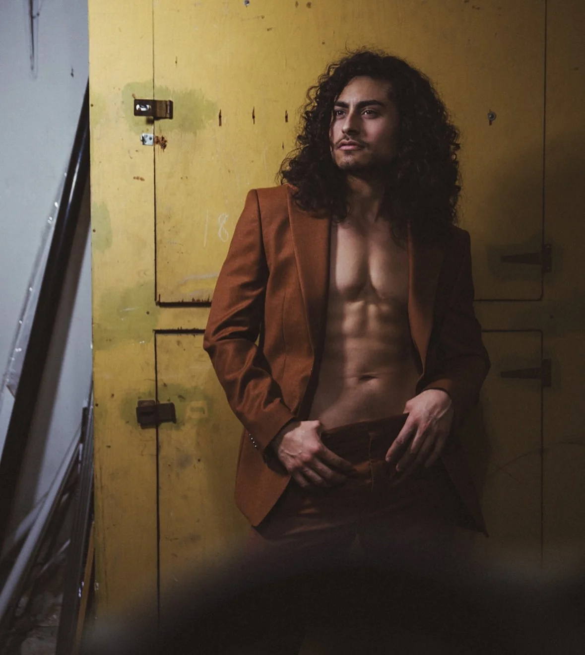 Emmett Preciado - orange suit.jpg
