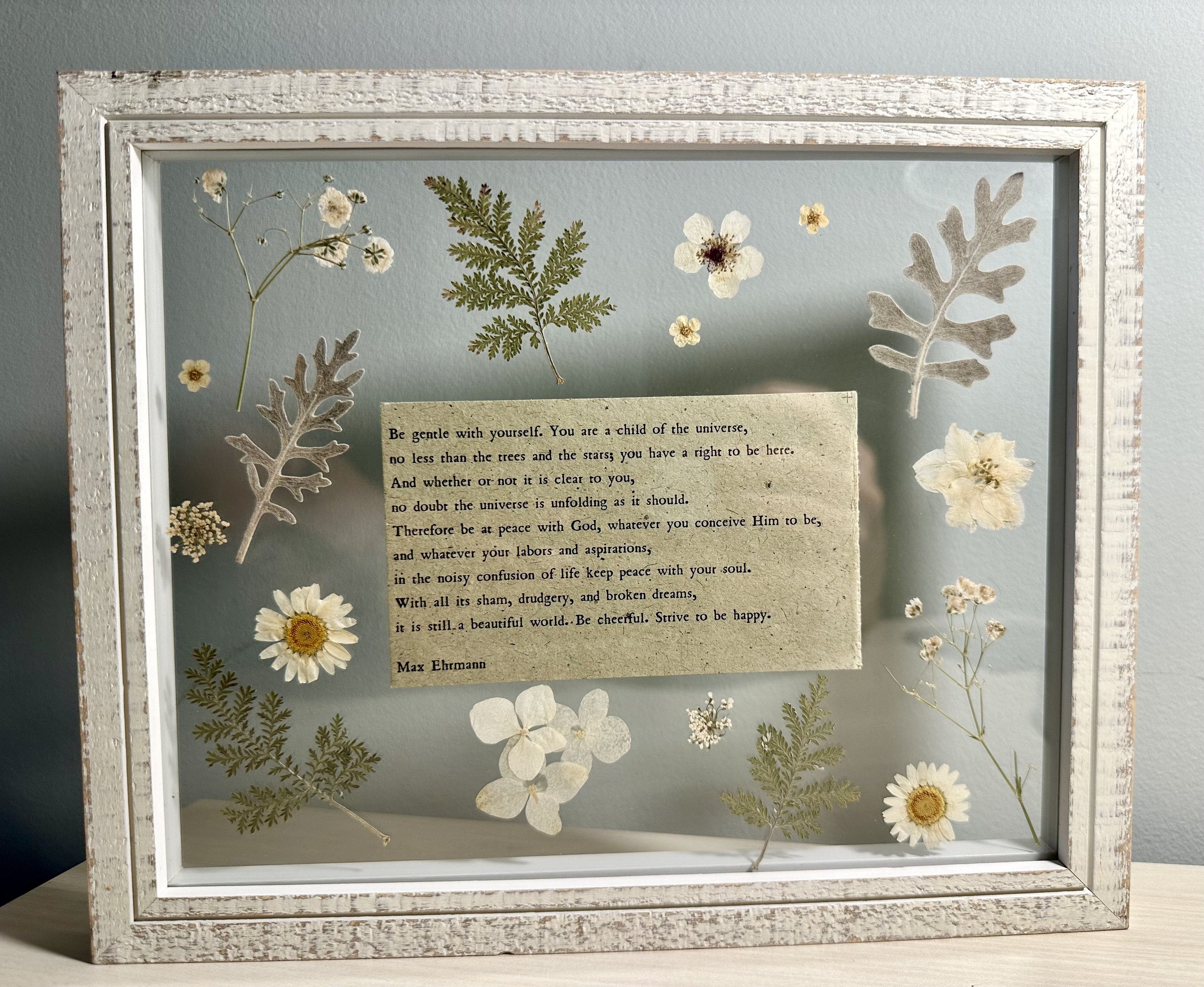 Framed flowers with quote