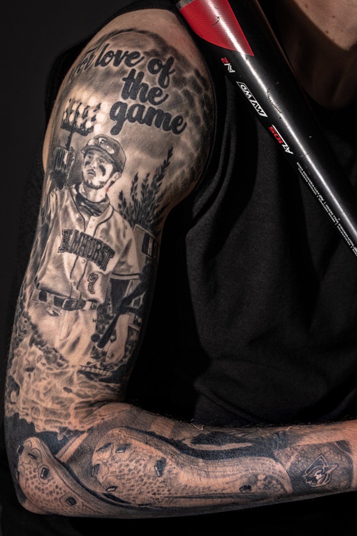 Black and grey baseball player tattoo sleeve. Tattoo art by Daniel Stewart at Signature Rose Professional Tattooing in Muncie Indiana.