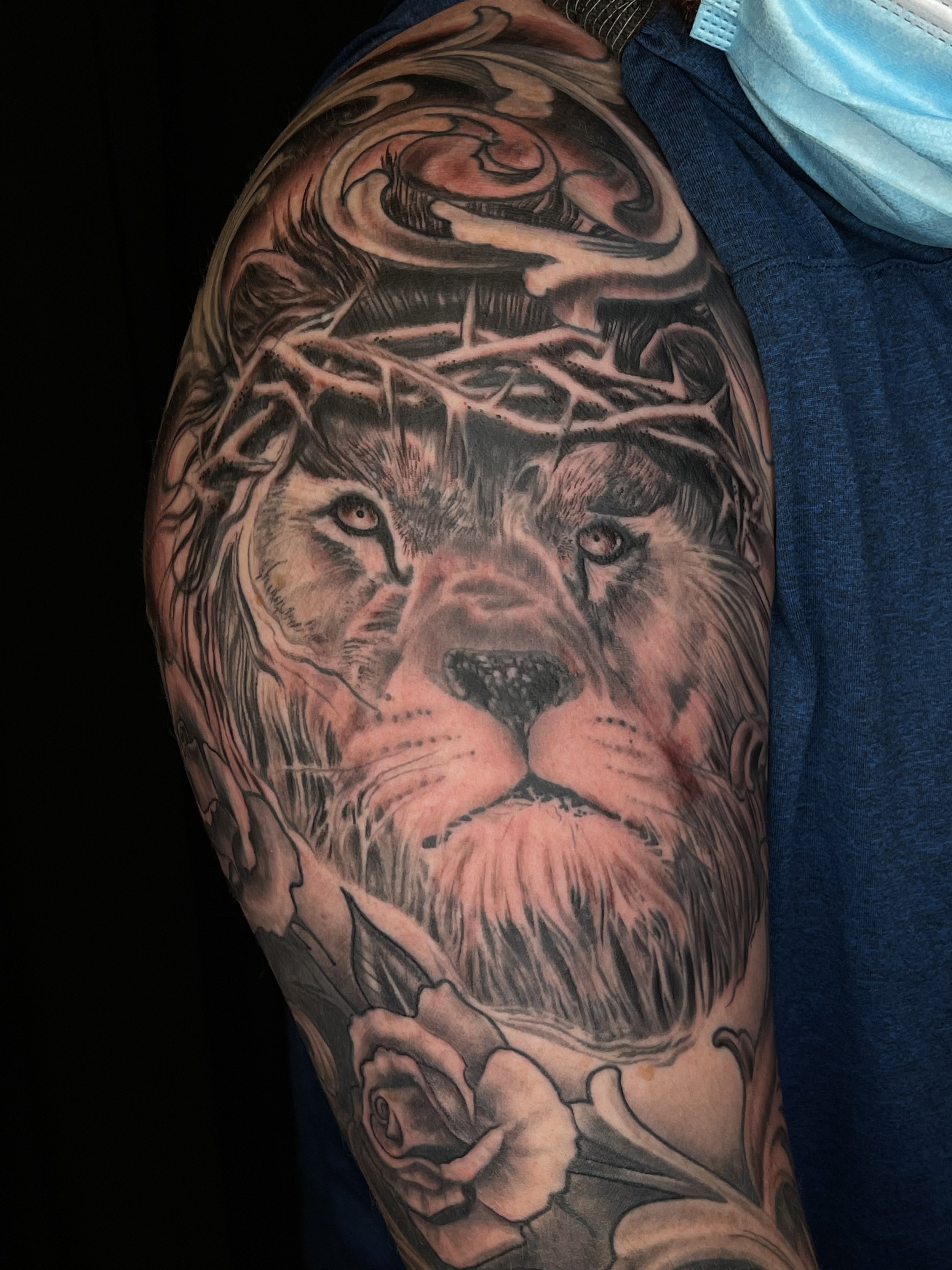 King Jesus lion tattoo done at Signature Rose in Muncie Indiana by Dan Stewart.