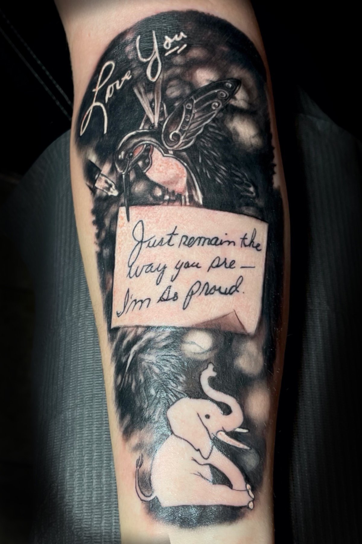 Black and grey tattoo design of a Christmas ornament and tree by by Daniel Stewart at Signature Rose Professional Tattooing in Muncie Indiana.