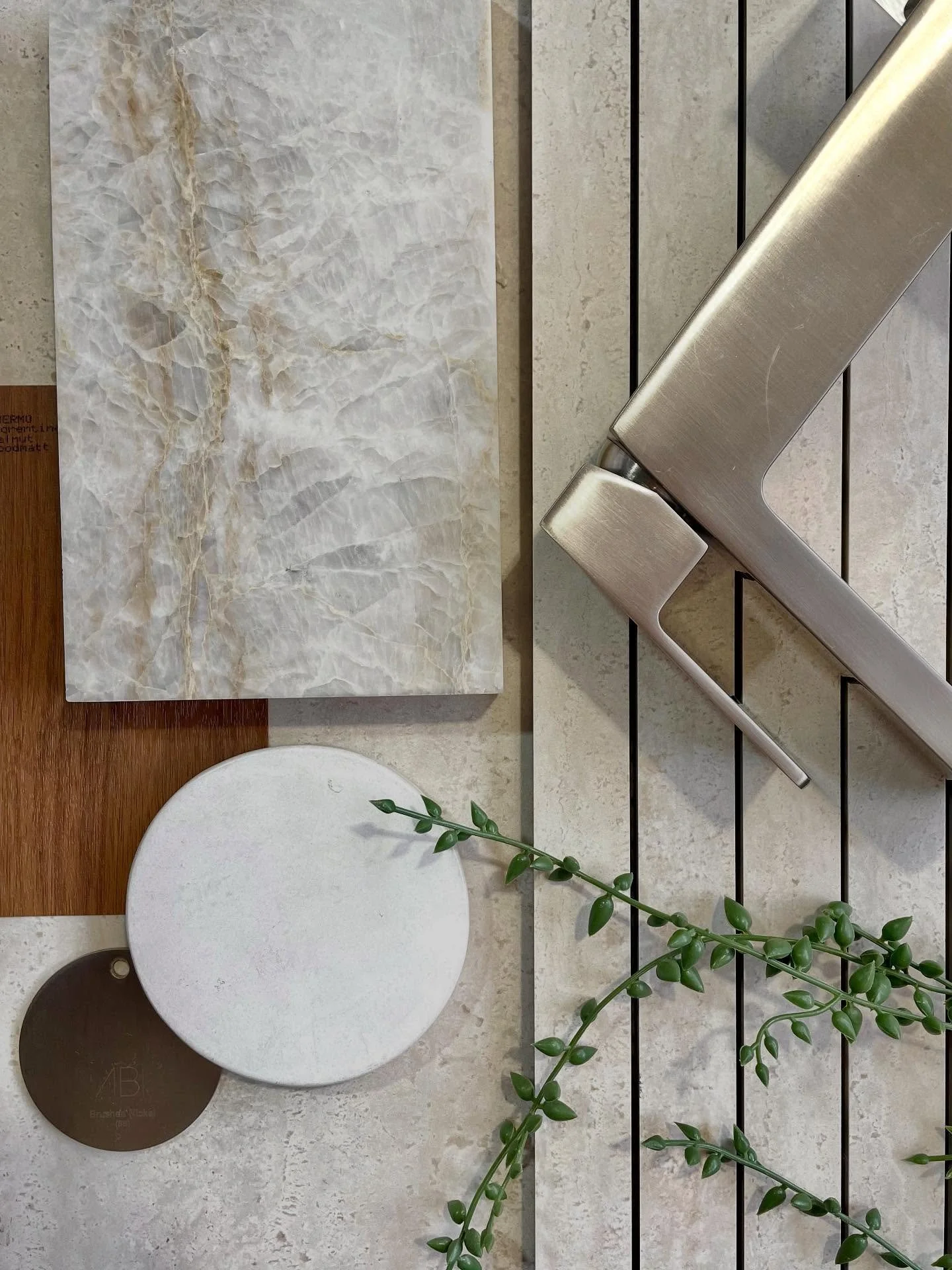 Today&rsquo;s flatlay for our client&rsquo;s bathroom embraces a soft monochromatic palette inspired by natural travertine. We explored three tile variations of the same hue: cross cut, vein cut, and a long narrow format, to layer subtle texture and 