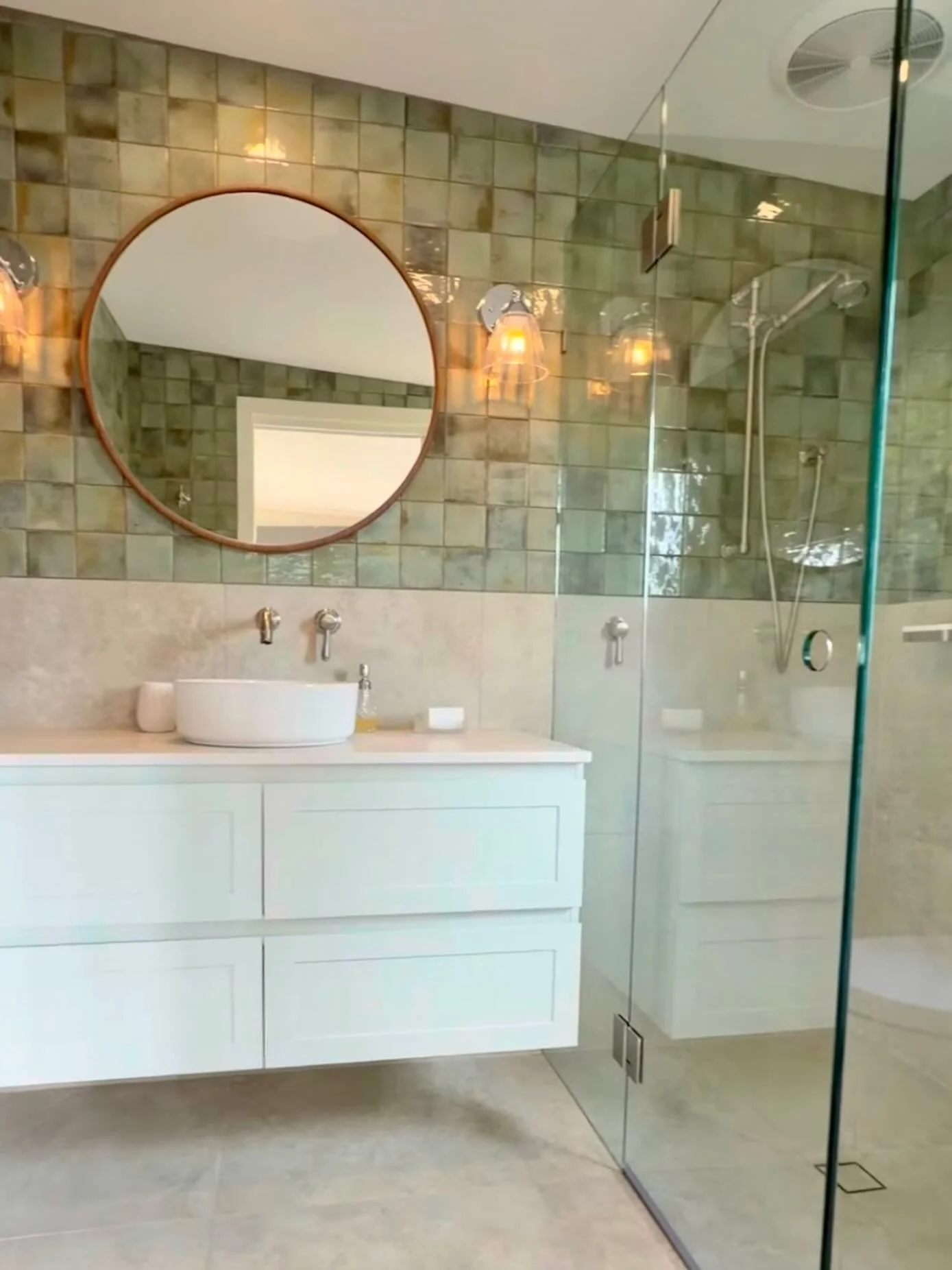 A warm, earthy bathroom redesign for a lovely local client. We reworked the layout to make the most of a compact footprint, leaning into warm green tones, textured tiles and a hint of vintage nostalgia to create a homely, grounded feel. 

Services in