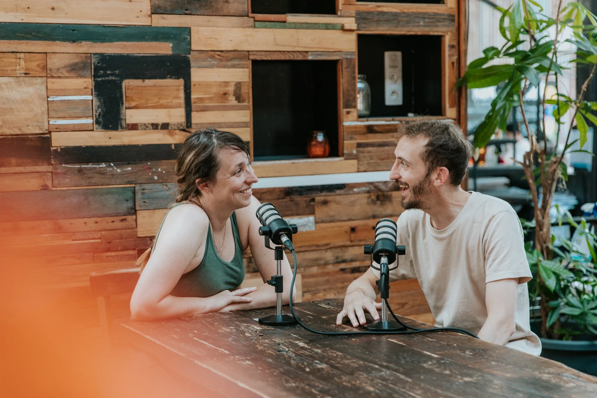 man and woman with microphones