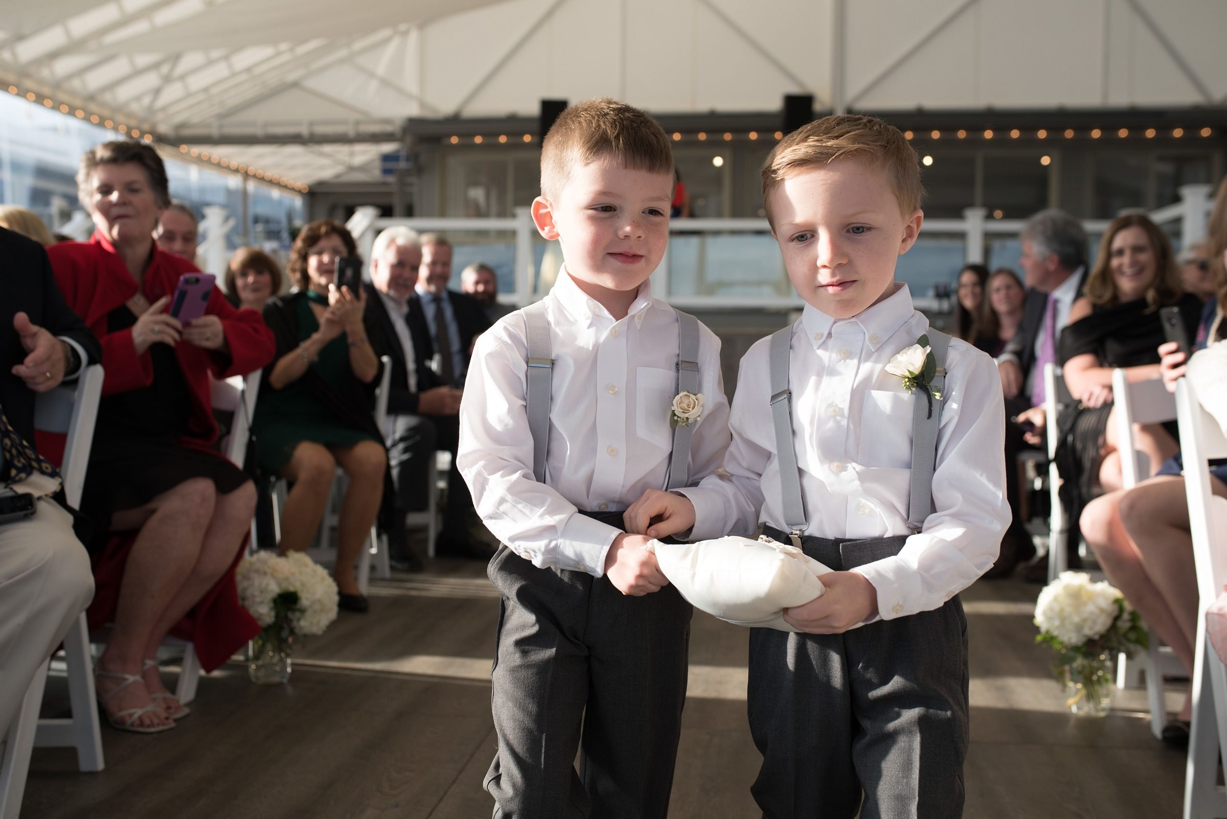 Popponesset Inn Wedding Ceremony with ring bearers walking down the aisle