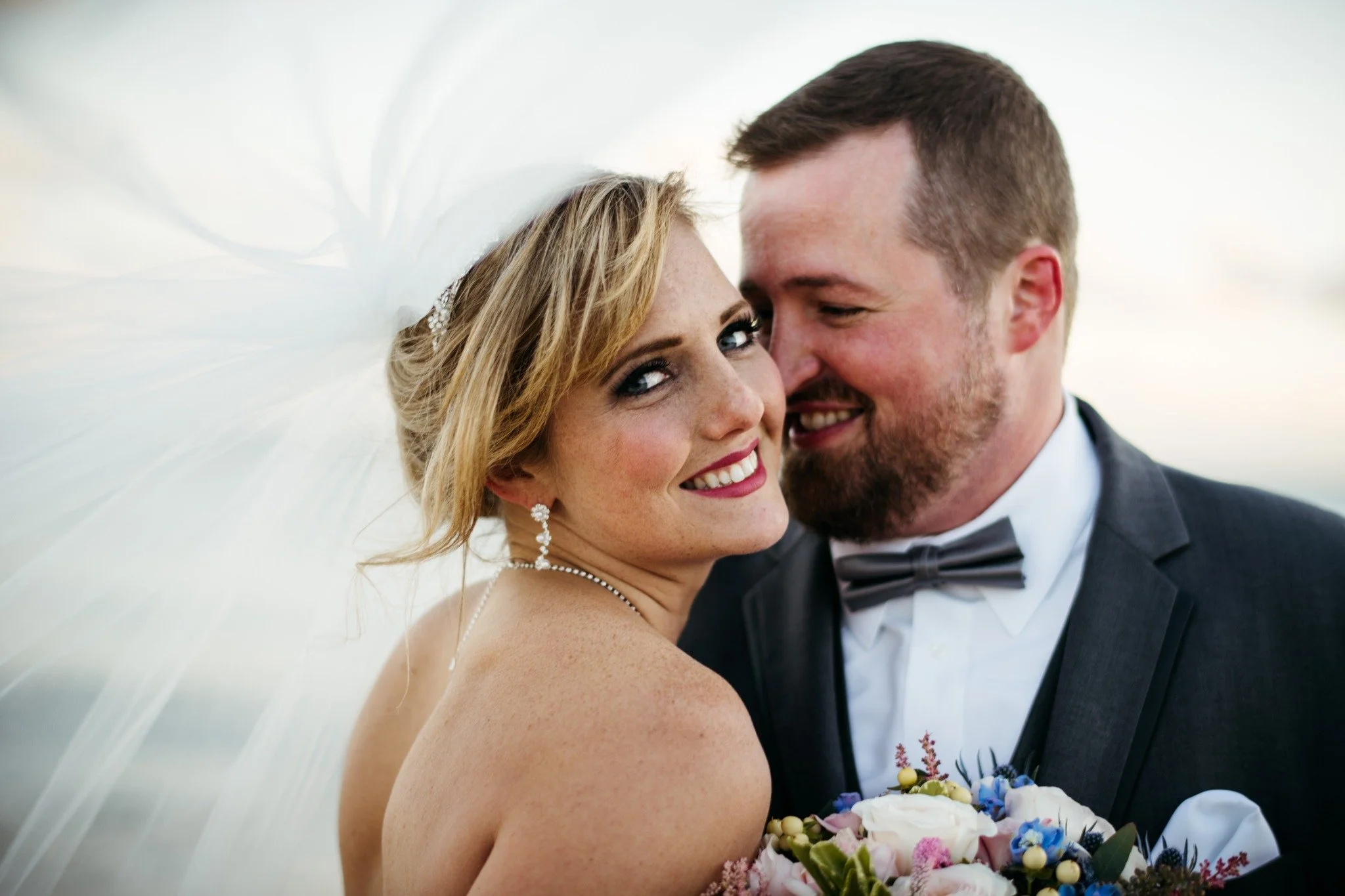 massachusetts-wedding-photographer-romantic-closeup-portrait-veil-blowing-019.jpg