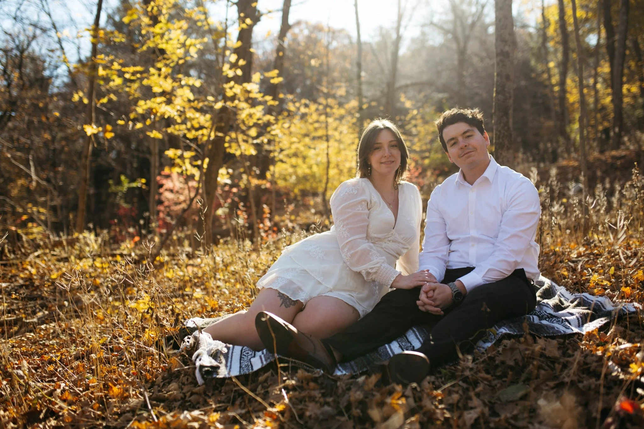boston-engagement-photo-fall-couple-sitting-in-leaves-golden-hour-013.jpg