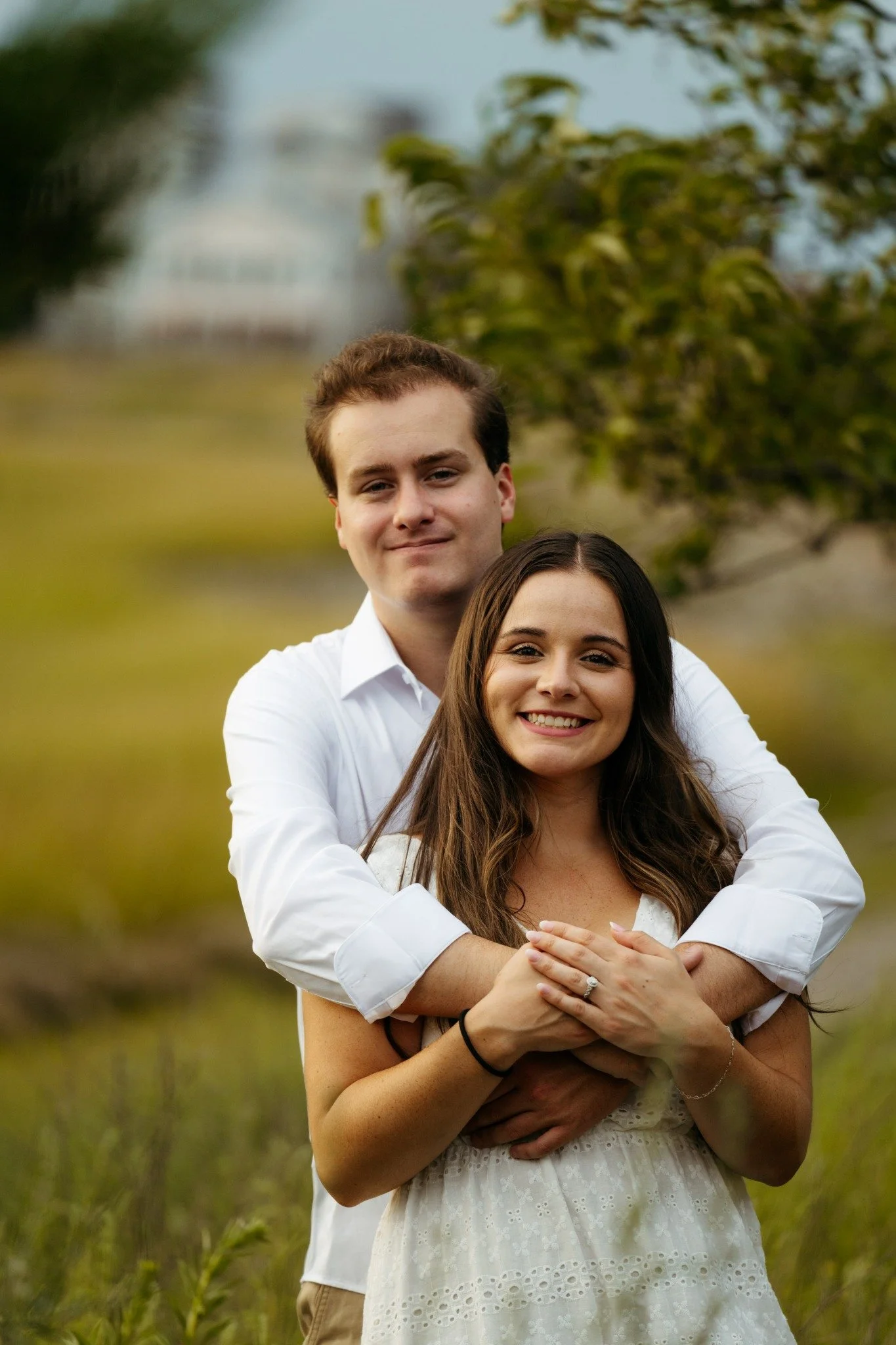 boston-engagement-photo-natural-outdoor-couple-hugging-warm-light-004.jpg