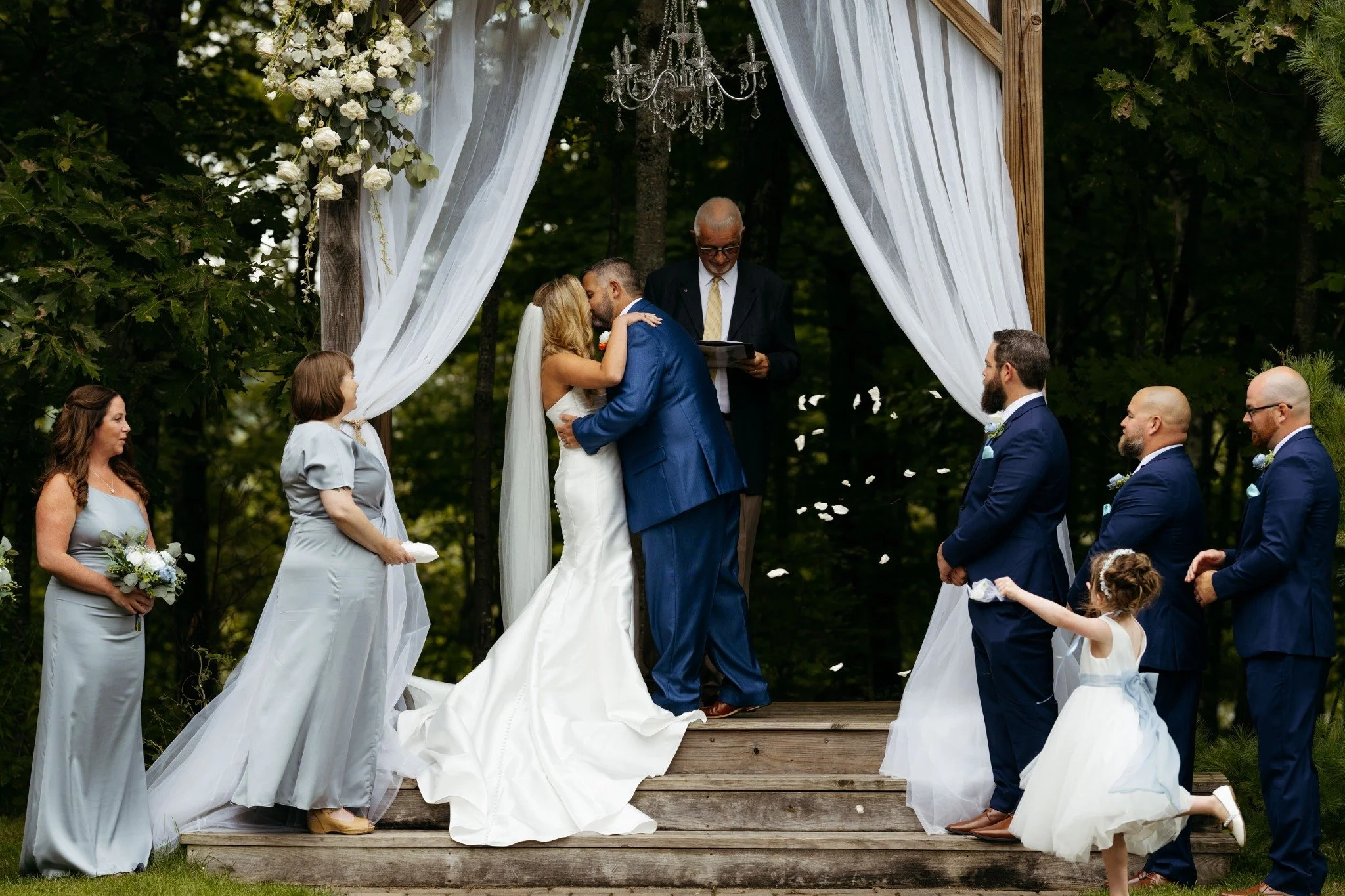 new-england-wedding-photographer-outdoor-ceremony-first-kiss-flower-girl-running-040.jpg