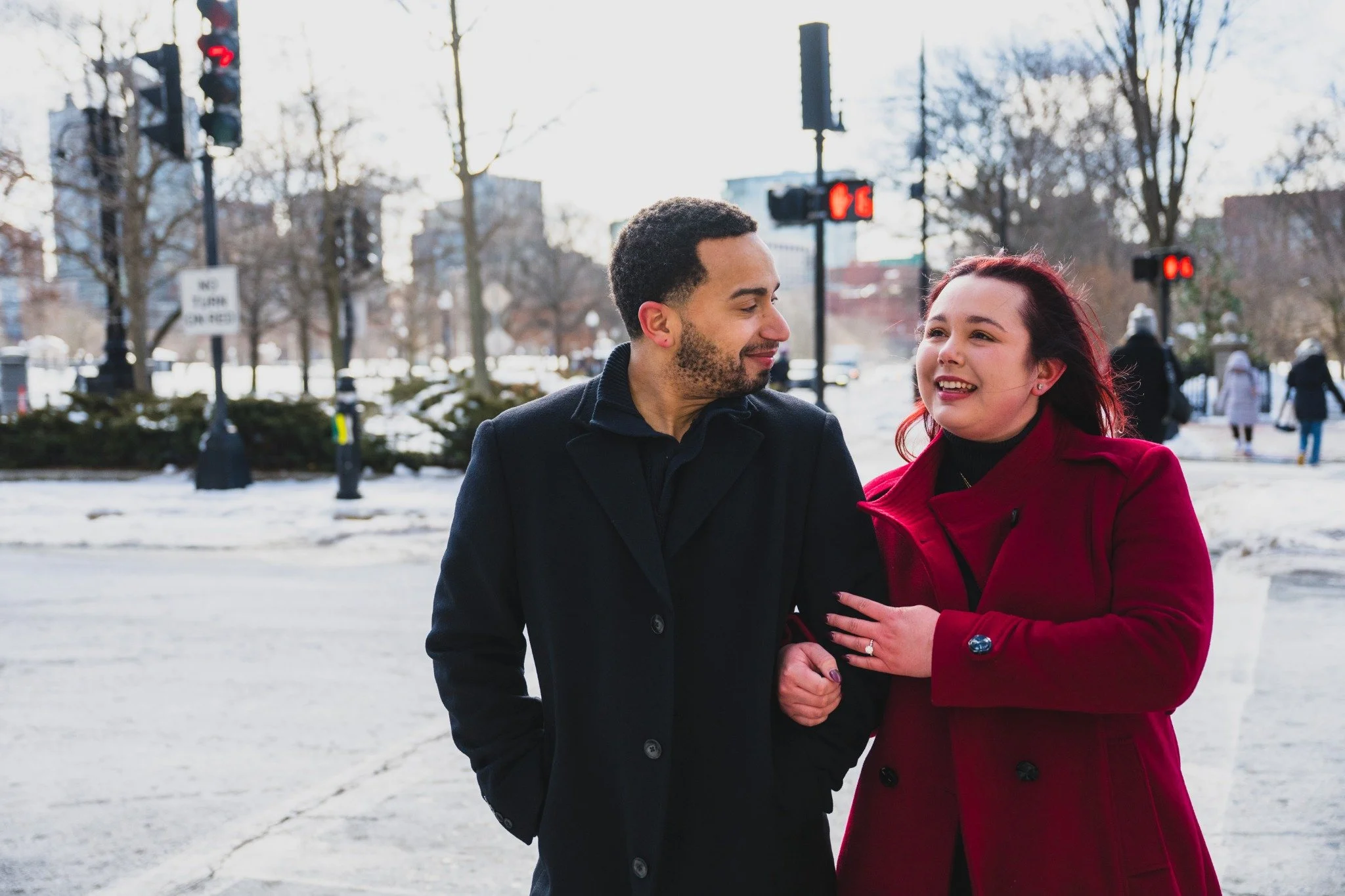massachusetts-engagement-session-urban-boston-winter-couple-walking-arm-in-arm-017.jpg