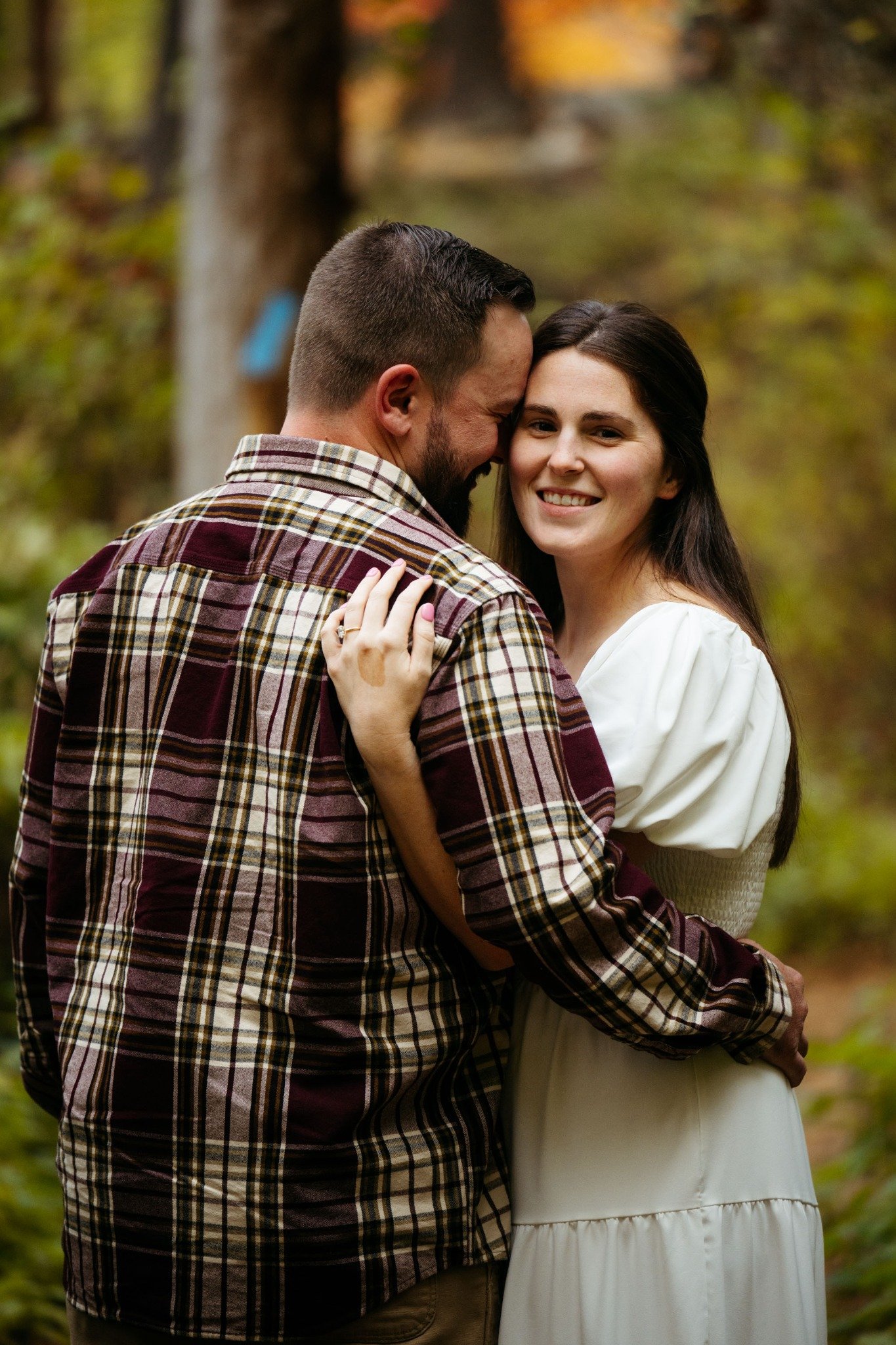 boston-engagement-photo-forest-couple-hugging-smiling-together-011.jpg