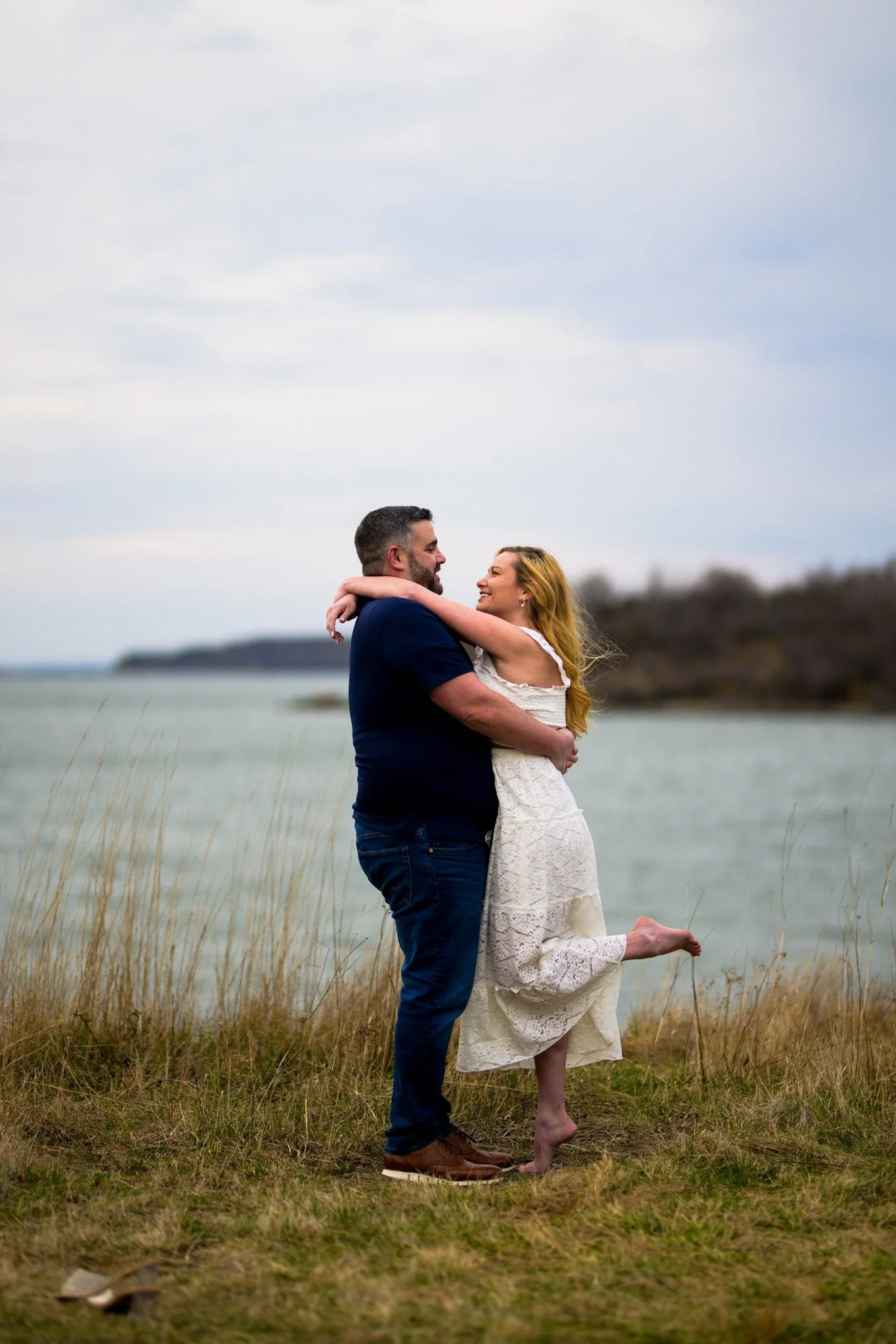 massachusetts-engagement-session-coastal-couple-embracing-tall-grass-019.jpg