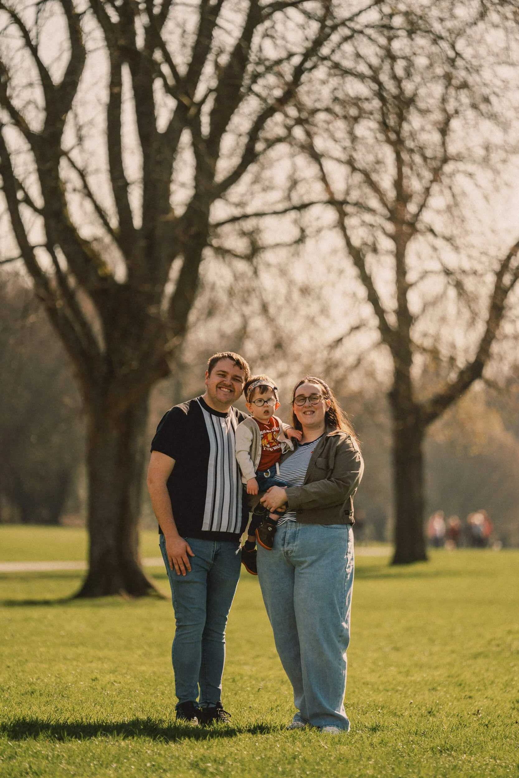 Family portrait photographed outdoors at Haigh Woodland Park in Wigan for Muscular Dystrophy UK.