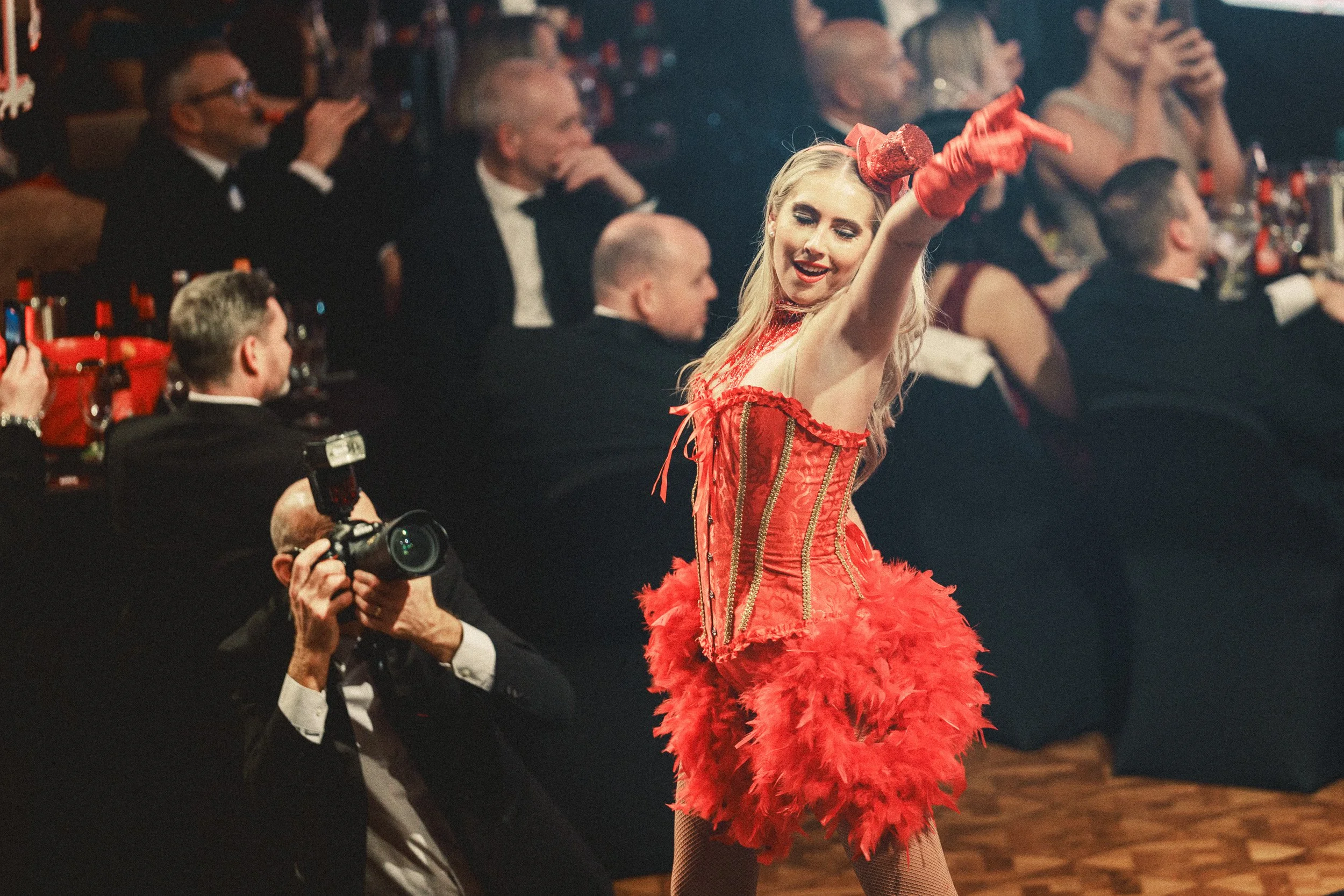 Dancer performing on stage during an awards ceremony.
