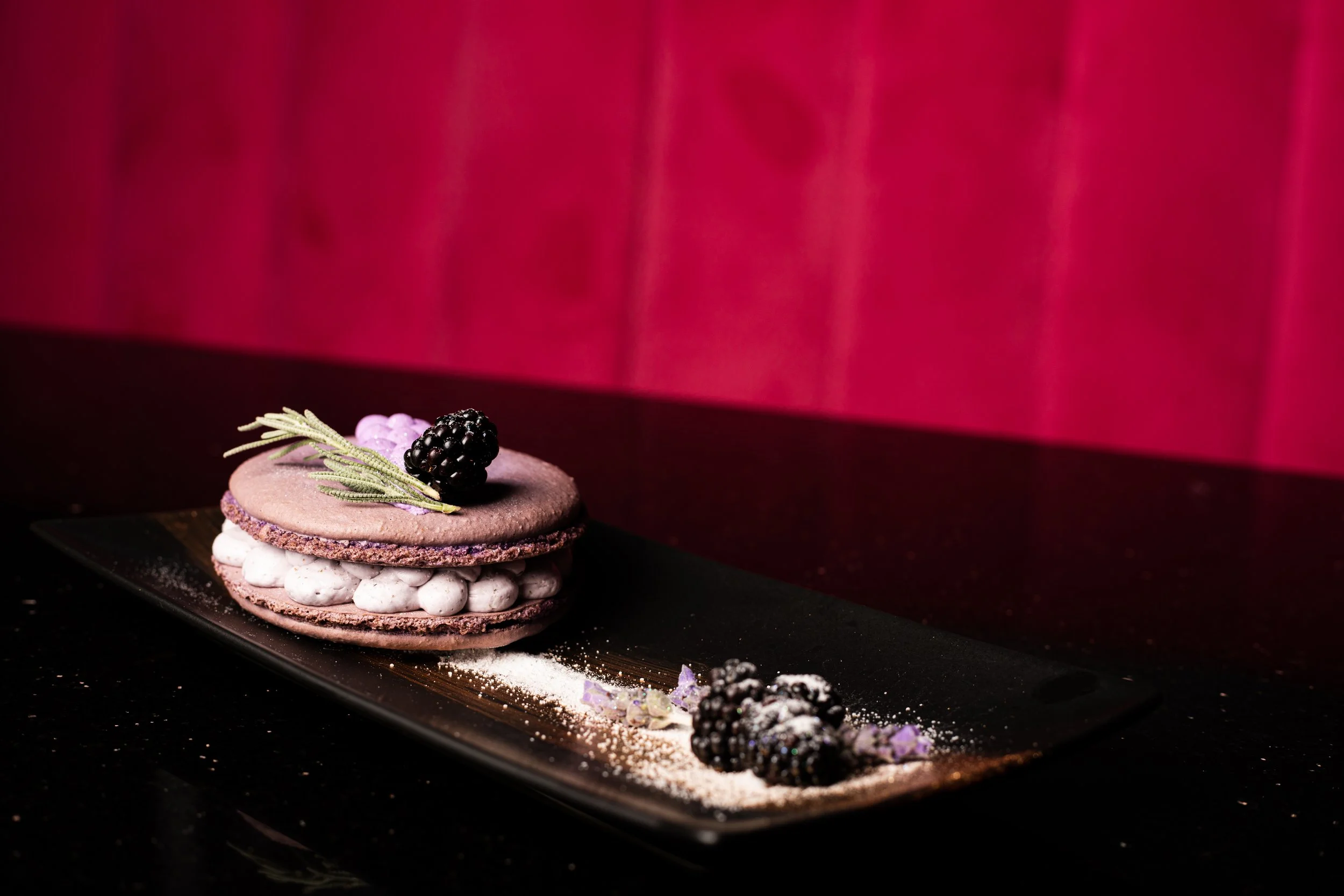 Lavender French macaron dessert at Silk cocktail bar small plates and dessert destination in Utica NY