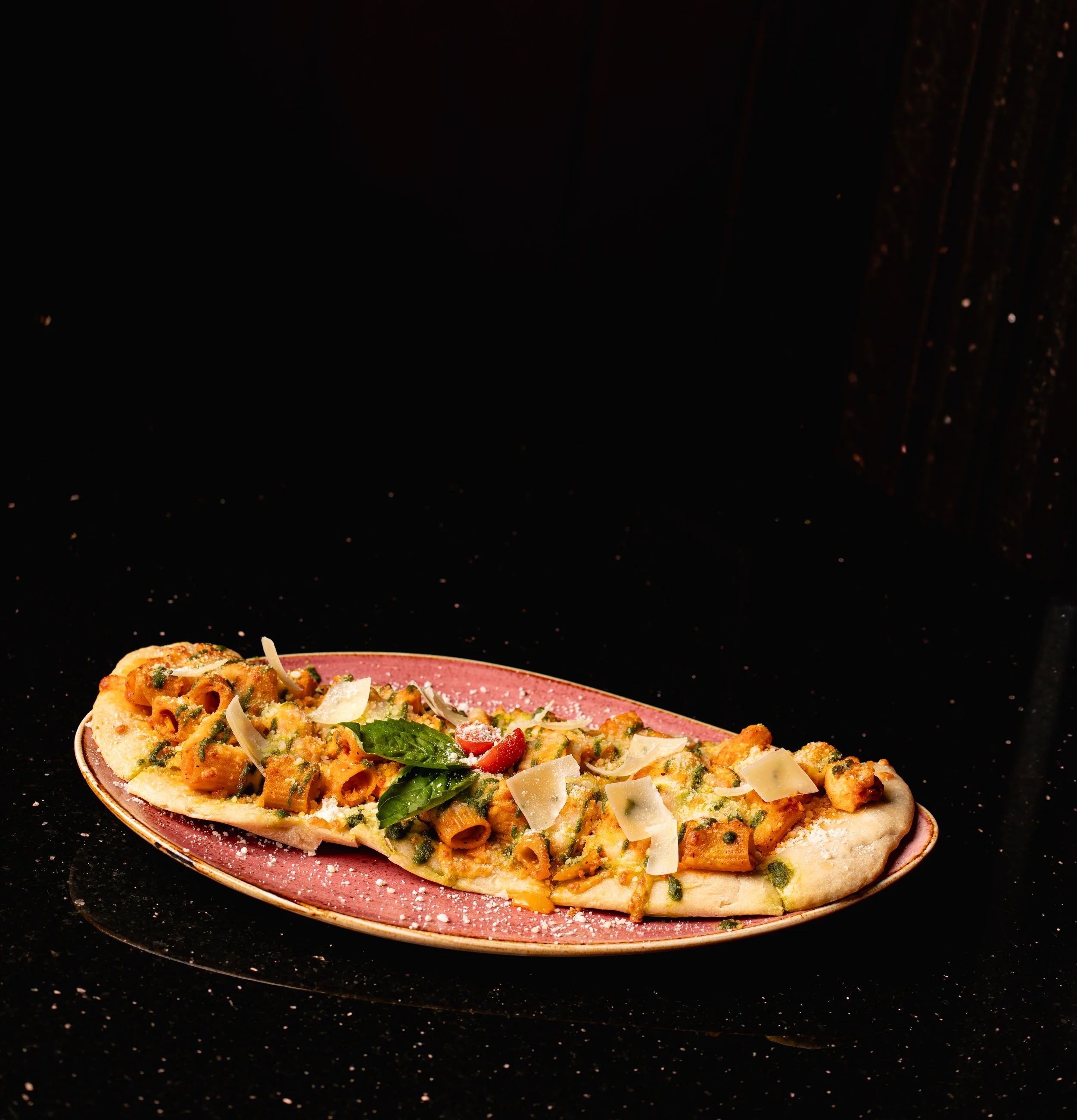 Chicken riggie flatbread small plate at Silk cocktail bar small plates and dessert destination in Utica NY