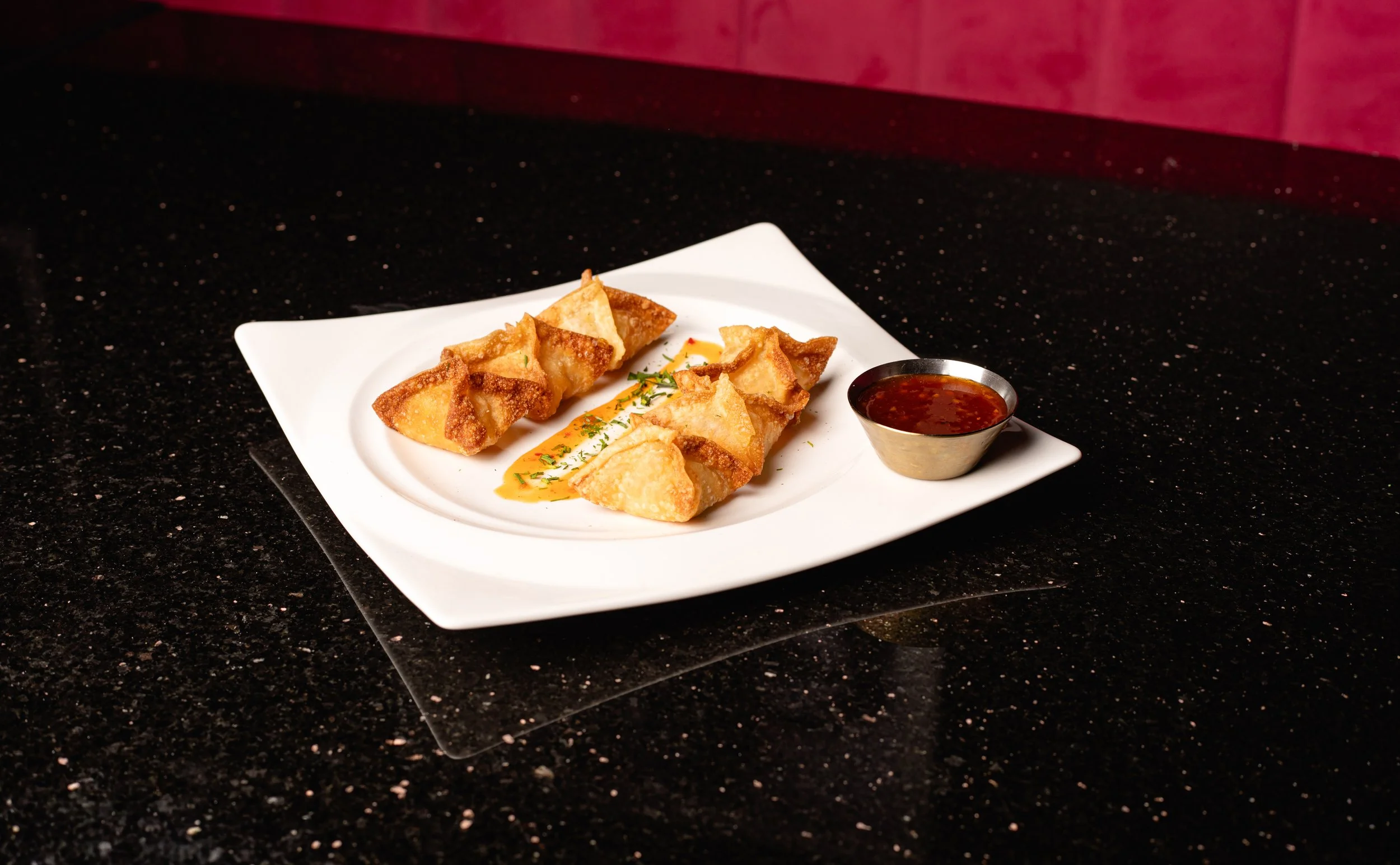 Shrimp and crab wontons small plate at Silk cocktail bar small plates and dessert destination in Utica NY