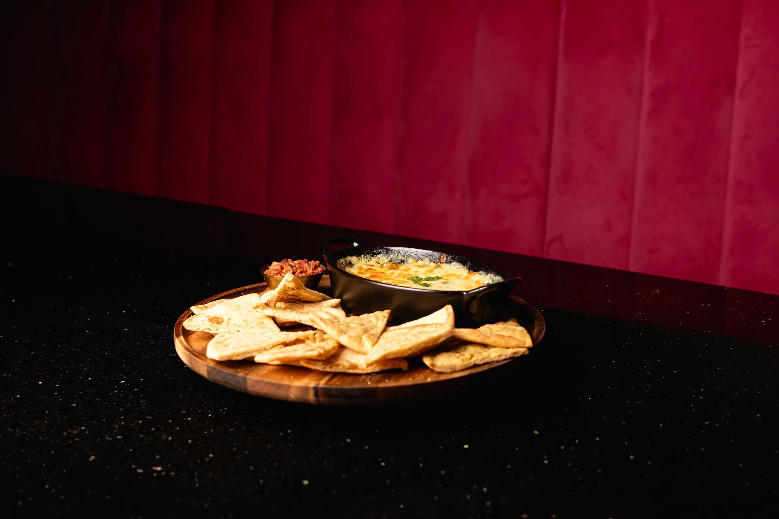 Spinach and artichoke dip catering at Silk cocktail bar small plates and dessert destination in Utica NY