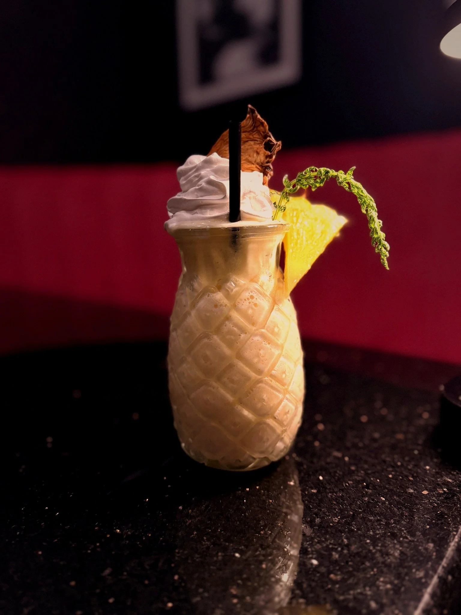 Pineapple dole whip cocktail at Silk cocktail bar small plates and dessert destination in Utica NY