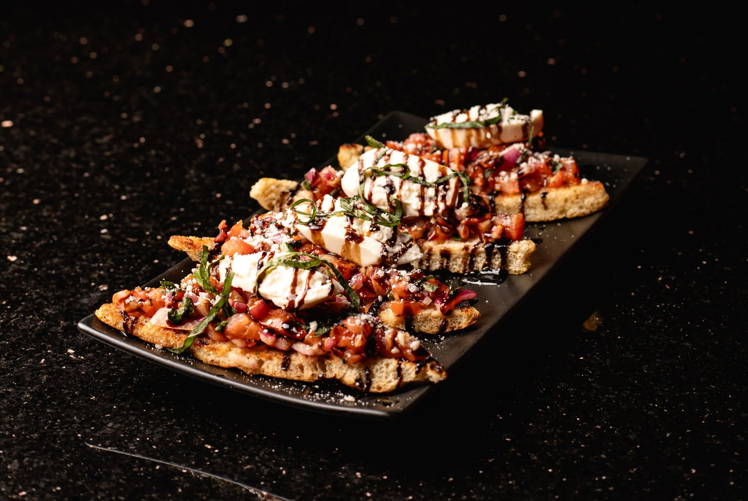 Bruschetta small plate at Silk cocktail bar small plates and dessert destination in Utica NY