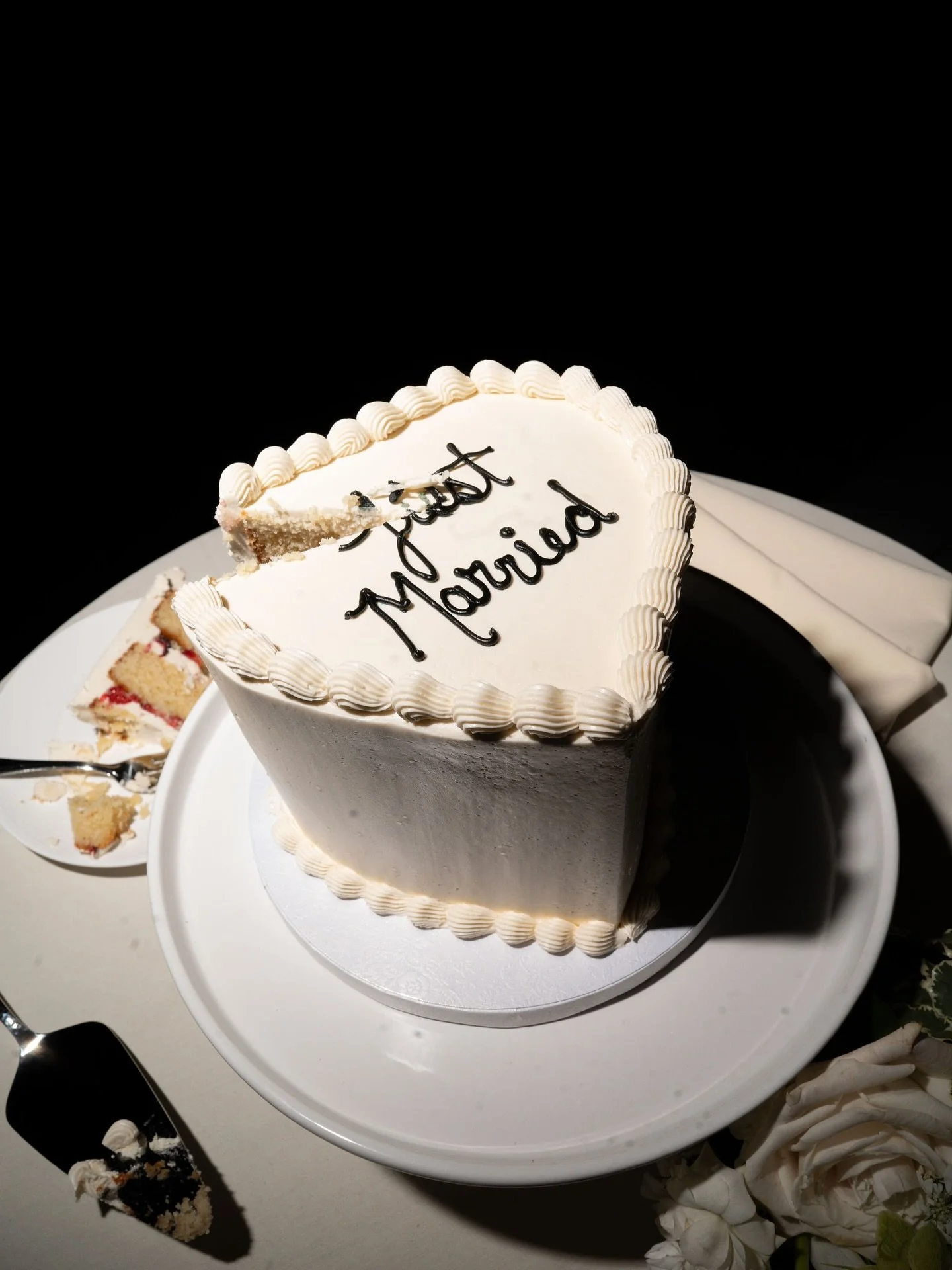 Perfect cake cutting moment with these two love birds! 

Our bride requested their cake be on display for dinner then moved for a private outdoor cake cutting with her and her hubby! After dinner our team set up the cake outside under the garden ligh