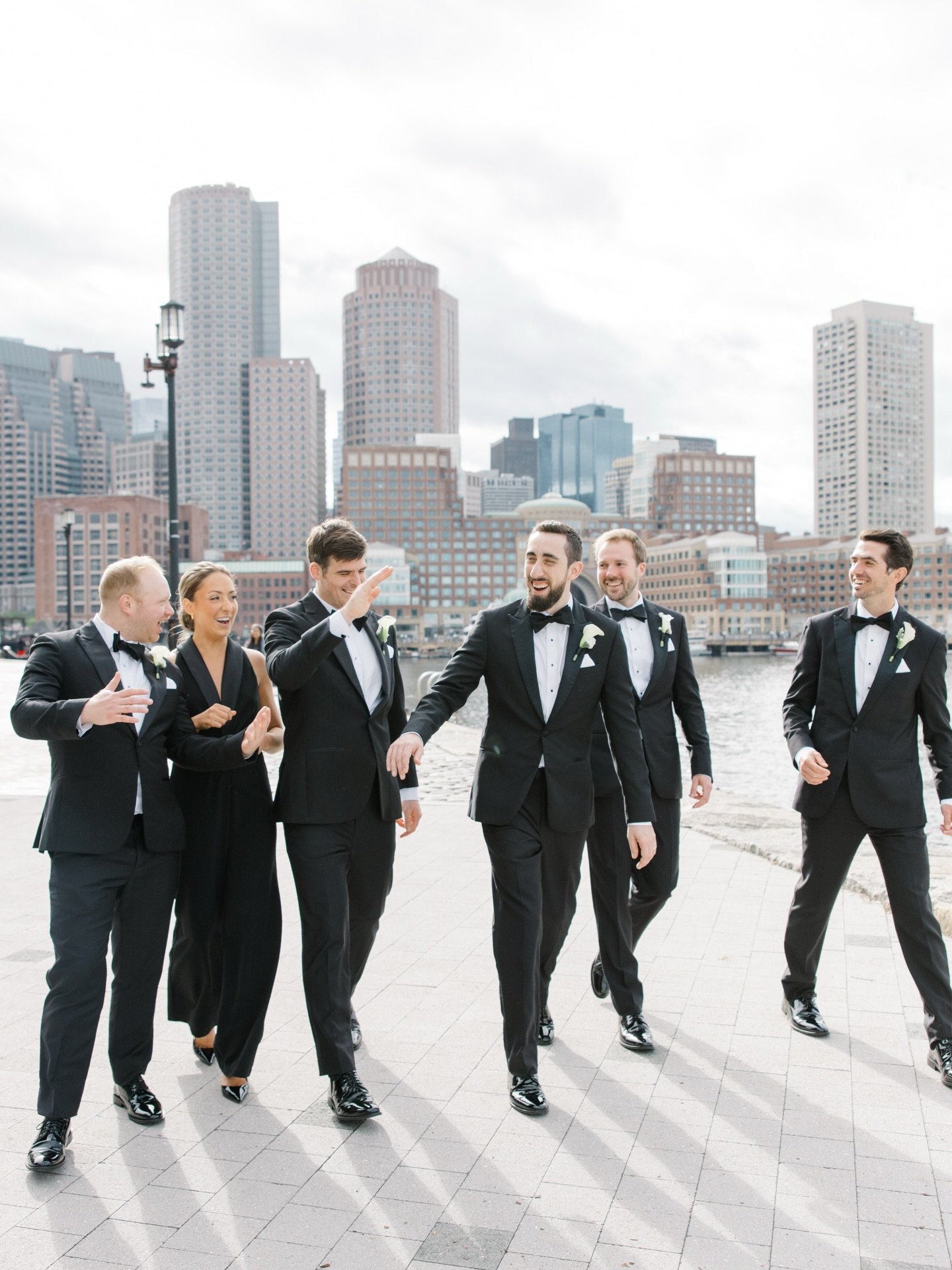 Sharp suits, city views, and the Charles at your feet. The groom and his crew brought effortless style to the Seaport-Can&rsquo;t ask for a better backdrop for pre ceremony wedding party photos. ✨🤍

Photographer @stephanieberensonphotography 
Videog
