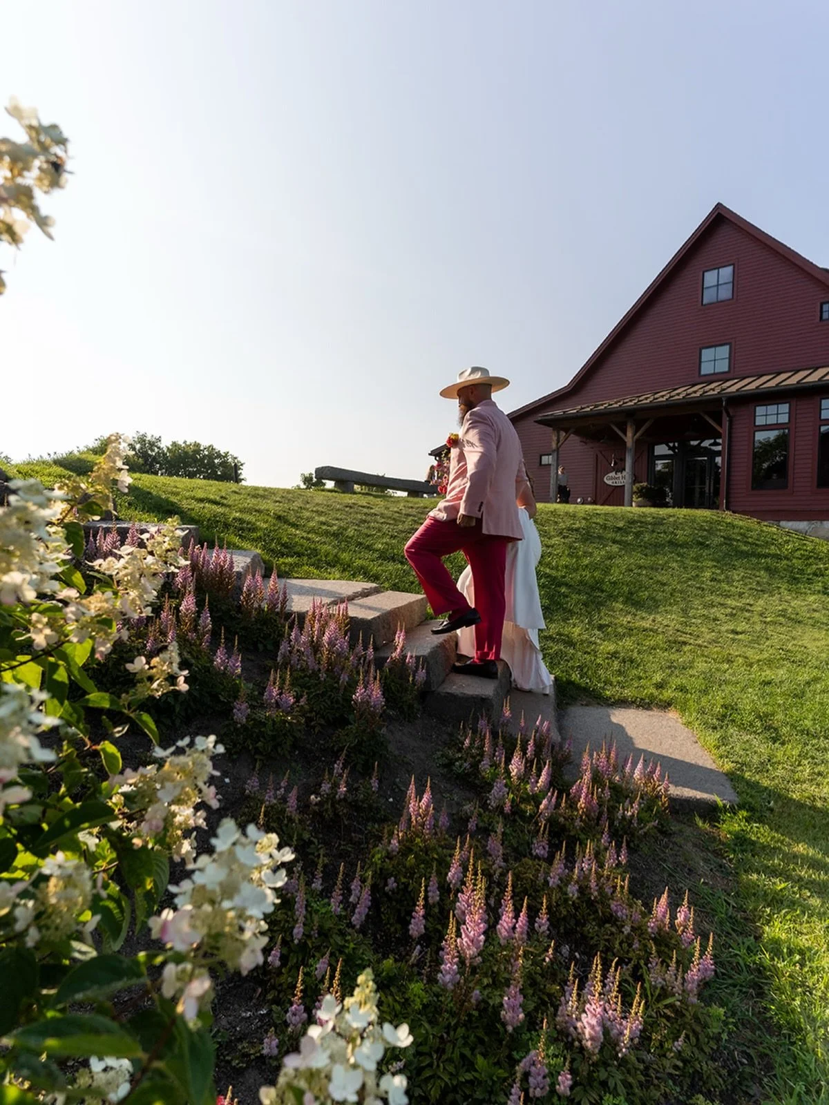 Post ceremony when golden hour hit just in time for H&amp;P&rsquo;s exit. Sometimes Mother Nature pulls the hell through. Nothing like @thebarnatgibbethill in the summer 🤌🏻🤌🏻

@jmleachdotworld