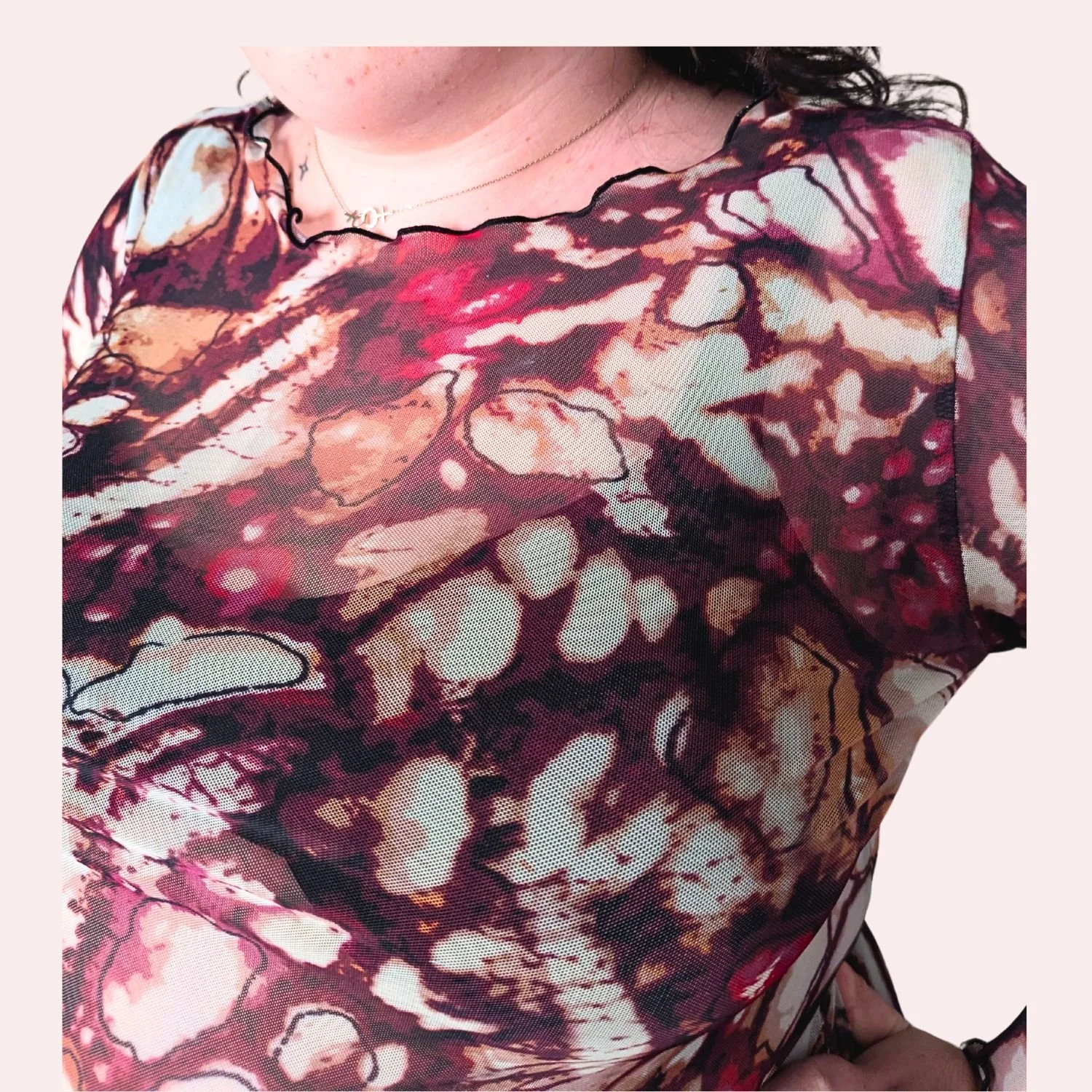 Mesh top merlot wings front pink background 2.jpg