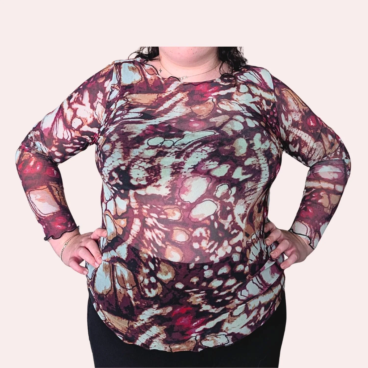 Mesh top merlot wings front pink background.jpg