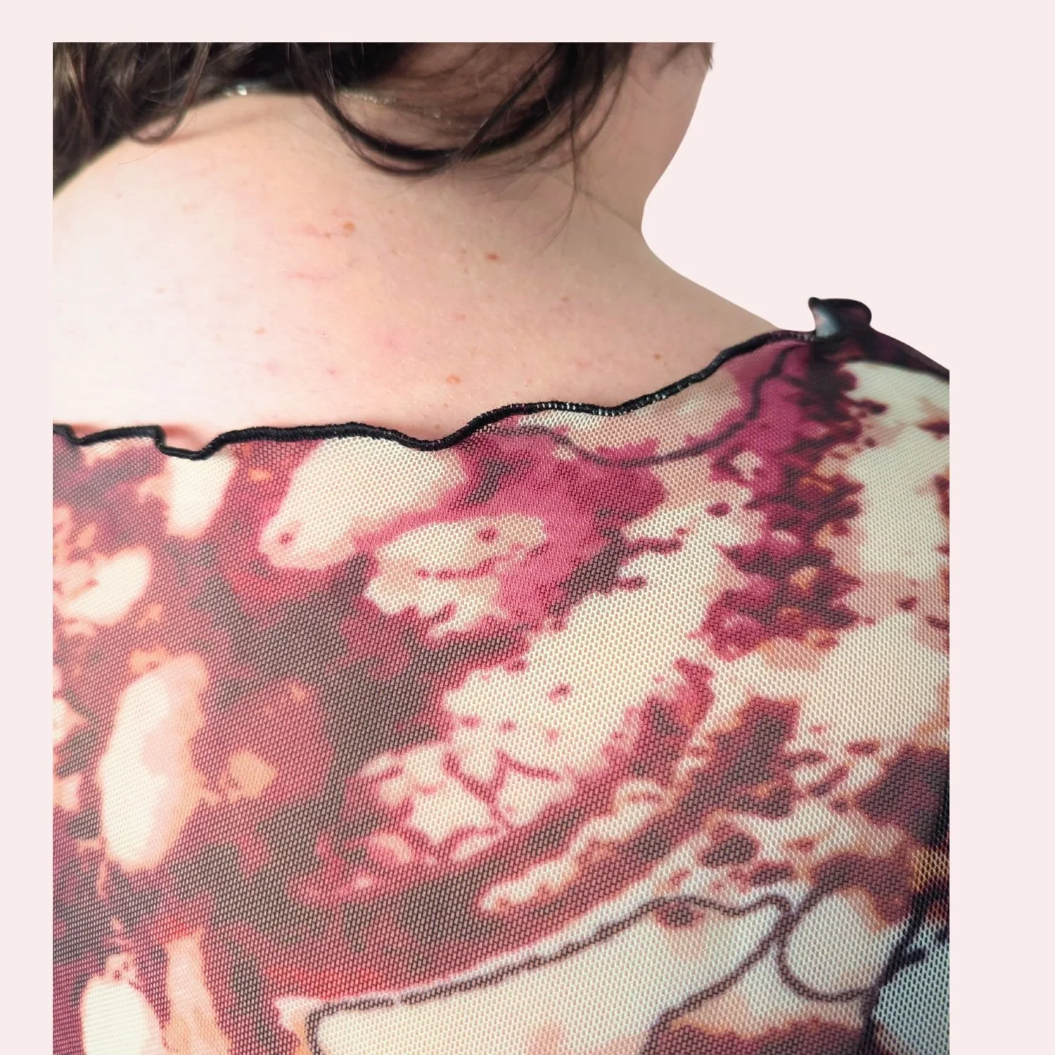 Mesh top merlot wings back pink background 2.jpg