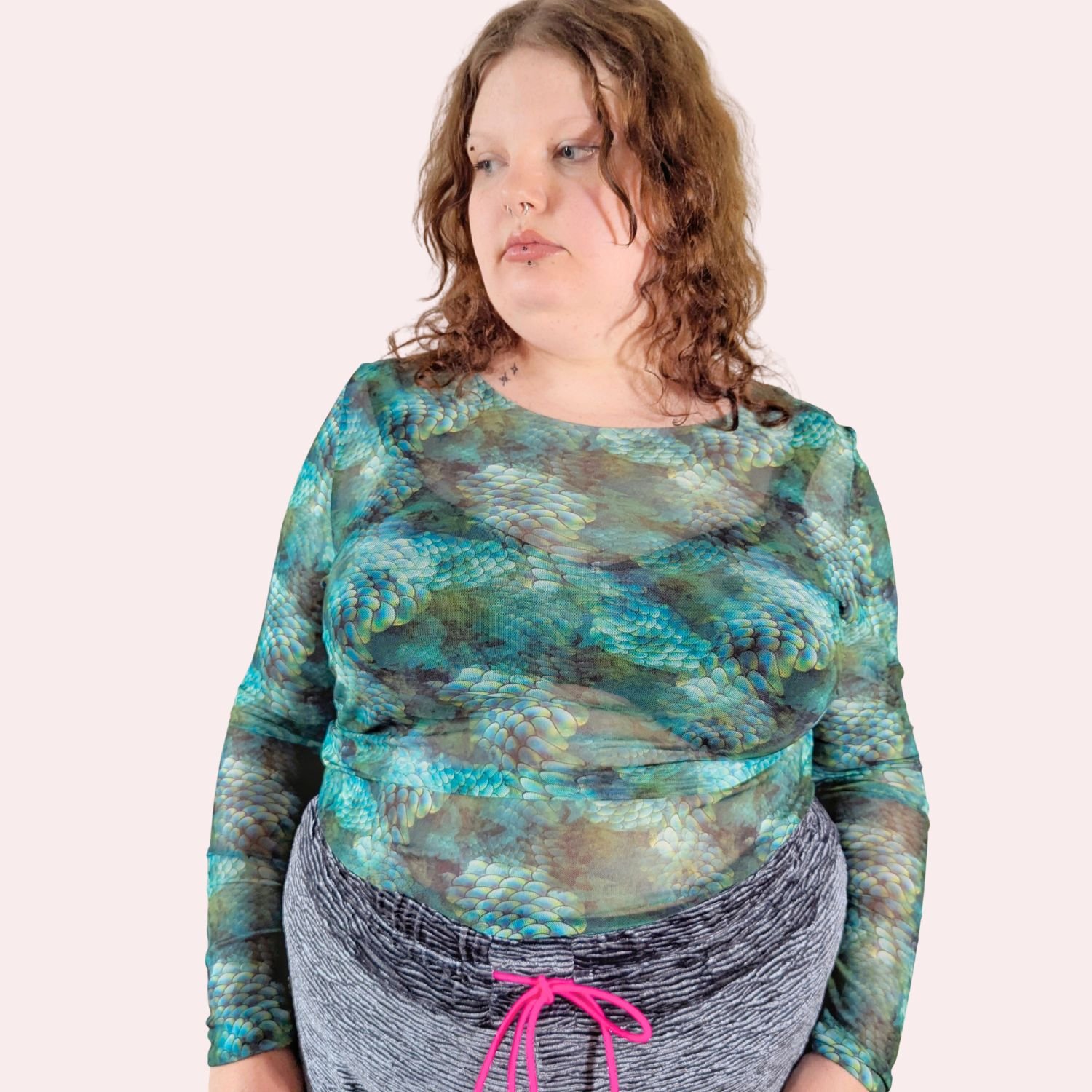 Mesh top turqoise front pink background .jpg