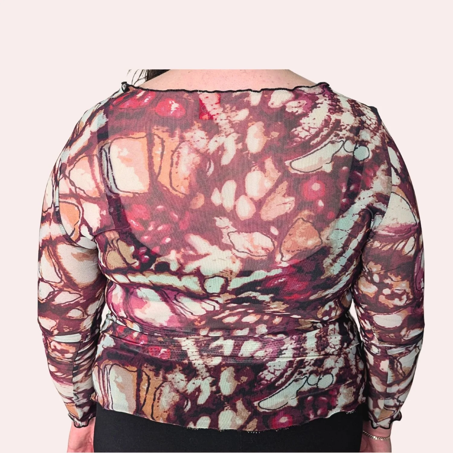 Mesh top merlot wings back pink background.jpg