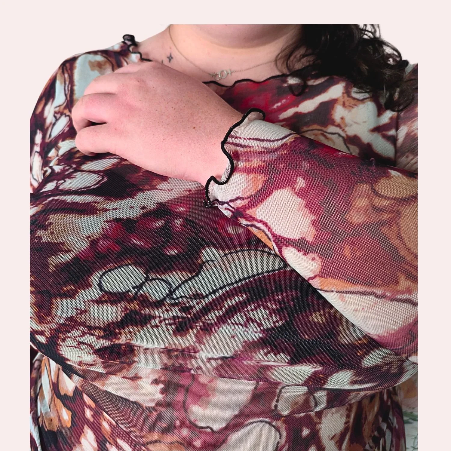 Mesh top merlot wings front pink background 3.jpg