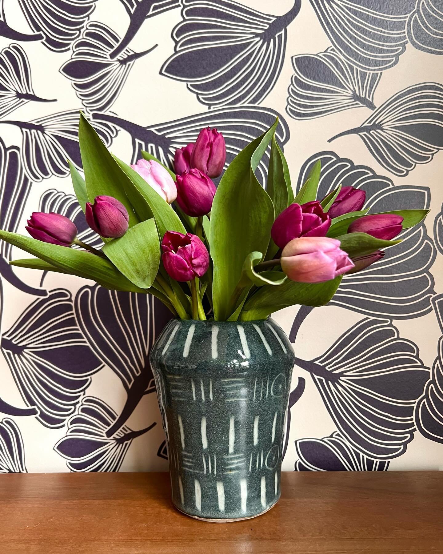 Hand carved stoneware vase available in my shop! #slowflowers #slowceramics #tulips #ceramics #ceramicist