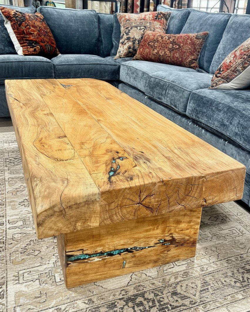 Chunky wood coffee table with turquoise inlay.