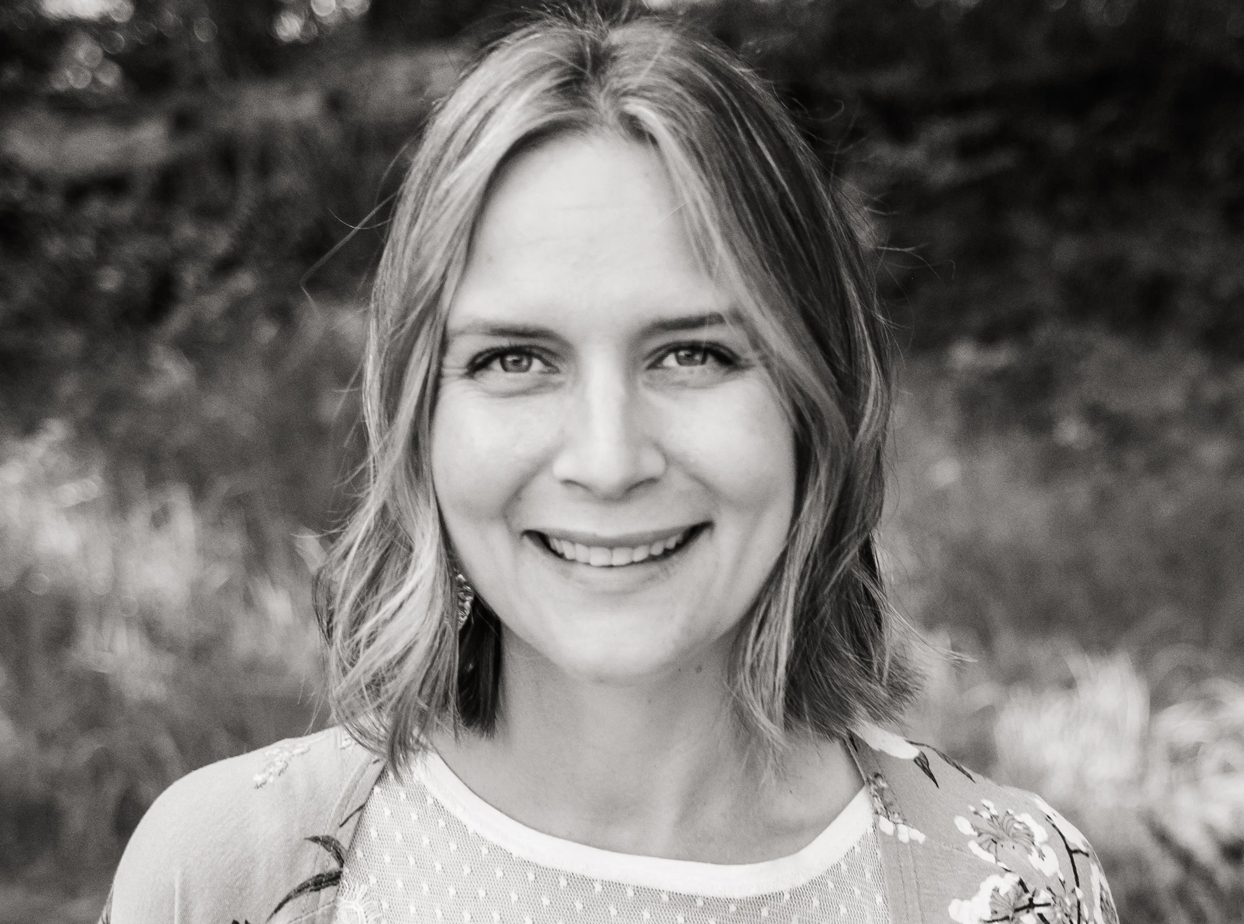smiling female counsellor outdoors
